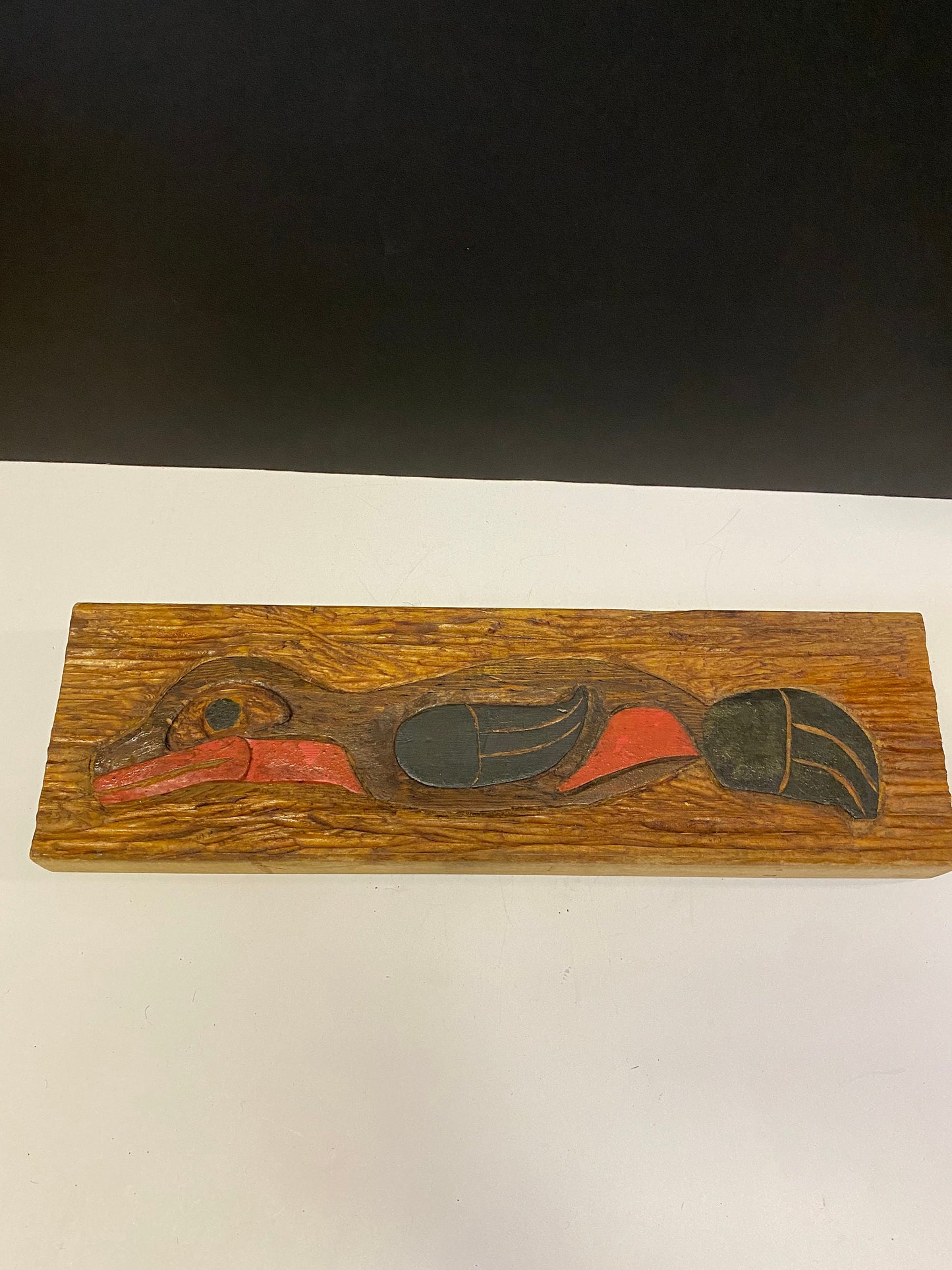 18 by 6 inches Indigenous First Nations carving of a bird signed and additional love on back - really unique folk art Canadian piece