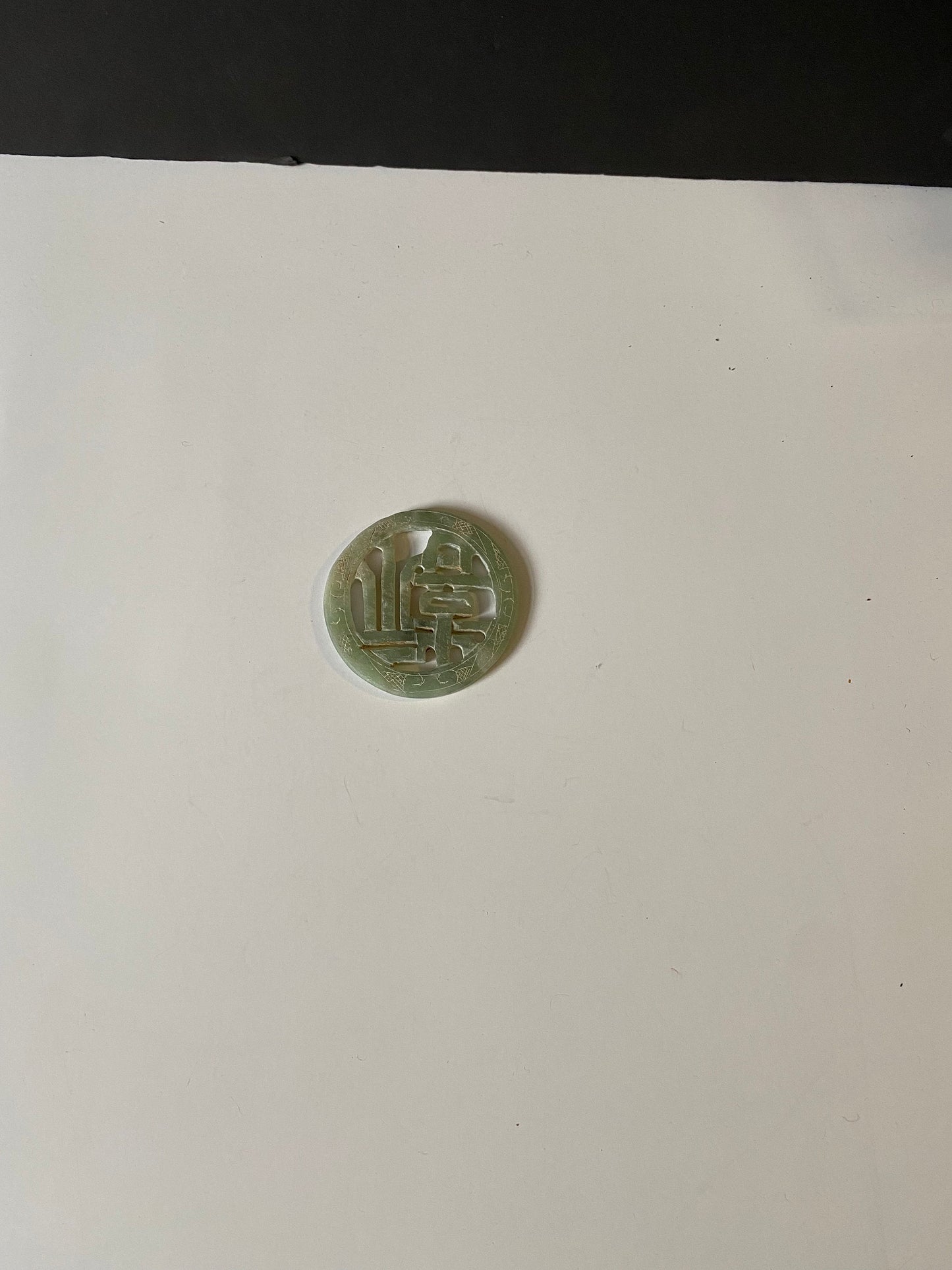 A Chinese 3 inch jade plaque