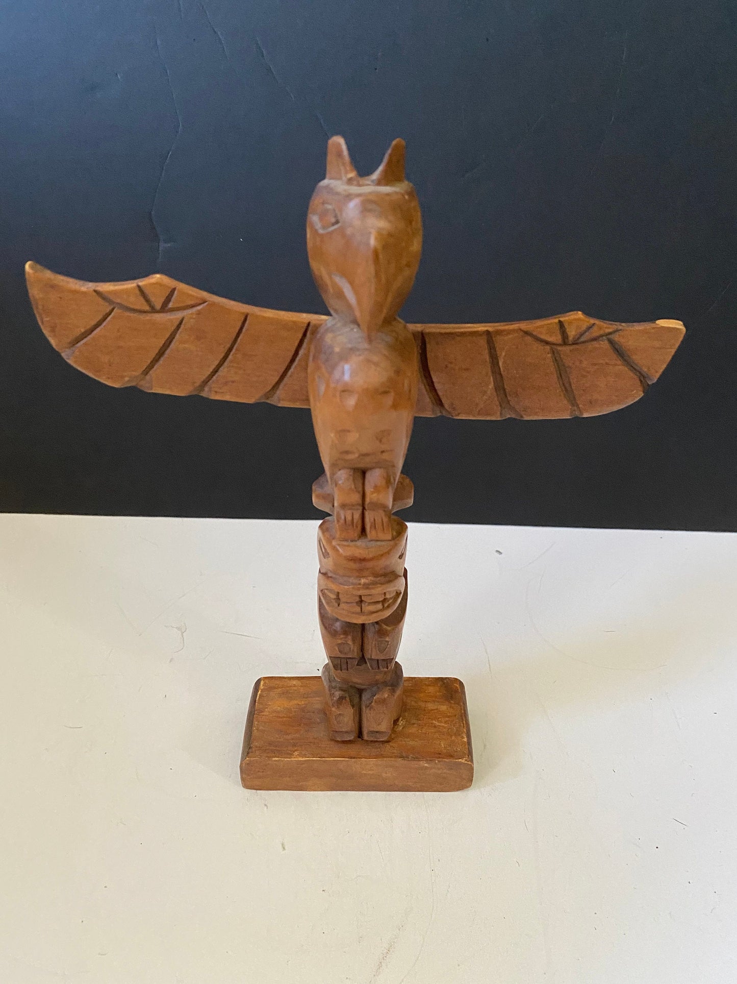 An indigenous First Nations 10 inch totem pole signed
