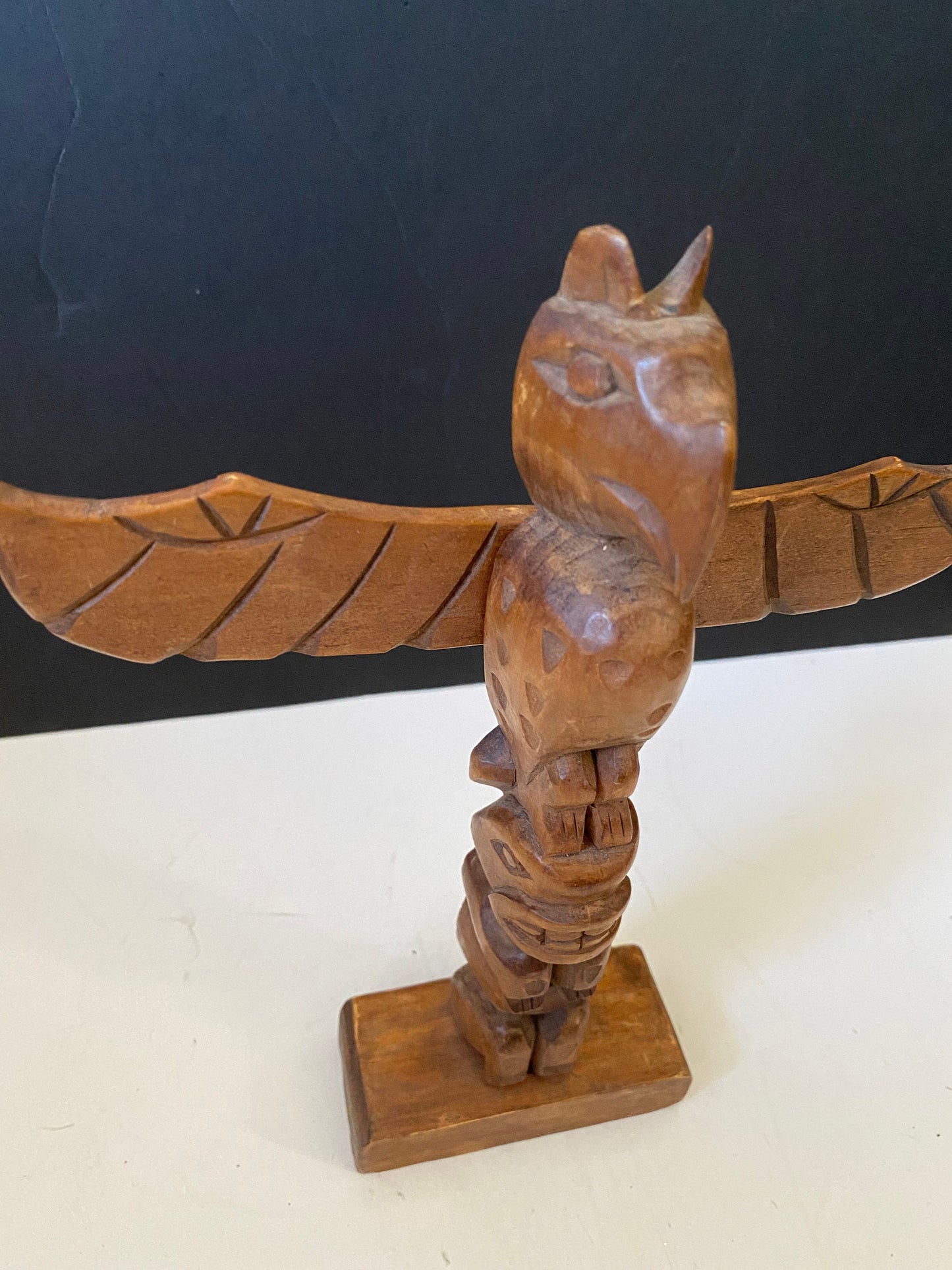 An indigenous First Nations 10 inch totem pole signed