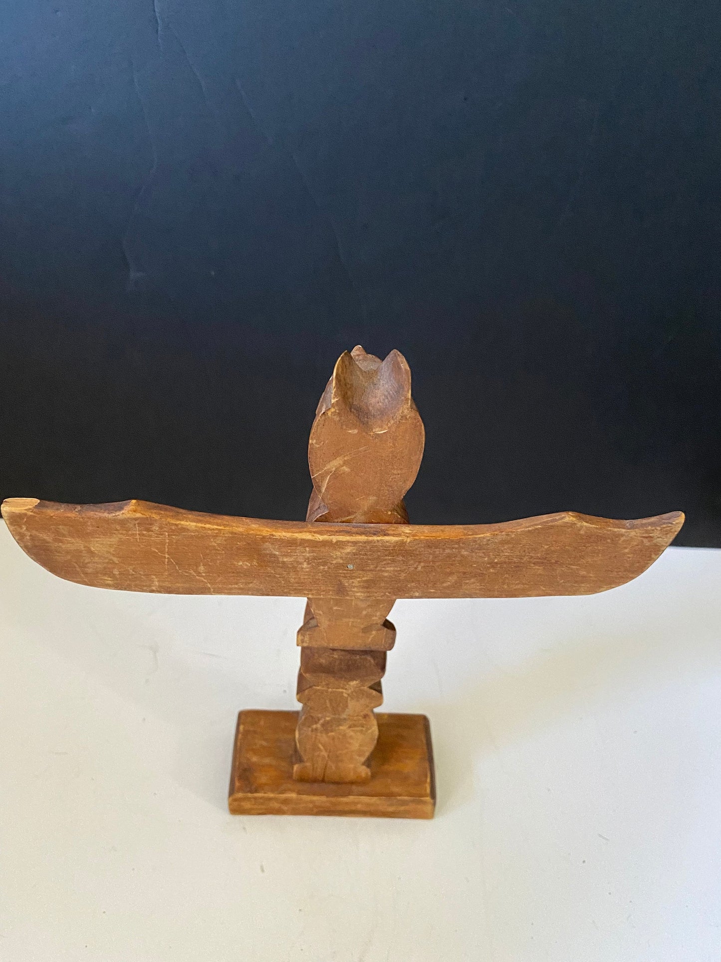 An indigenous First Nations 10 inch totem pole signed