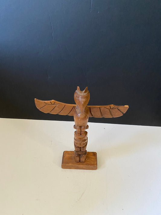 An indigenous First Nations 10 inch totem pole signed