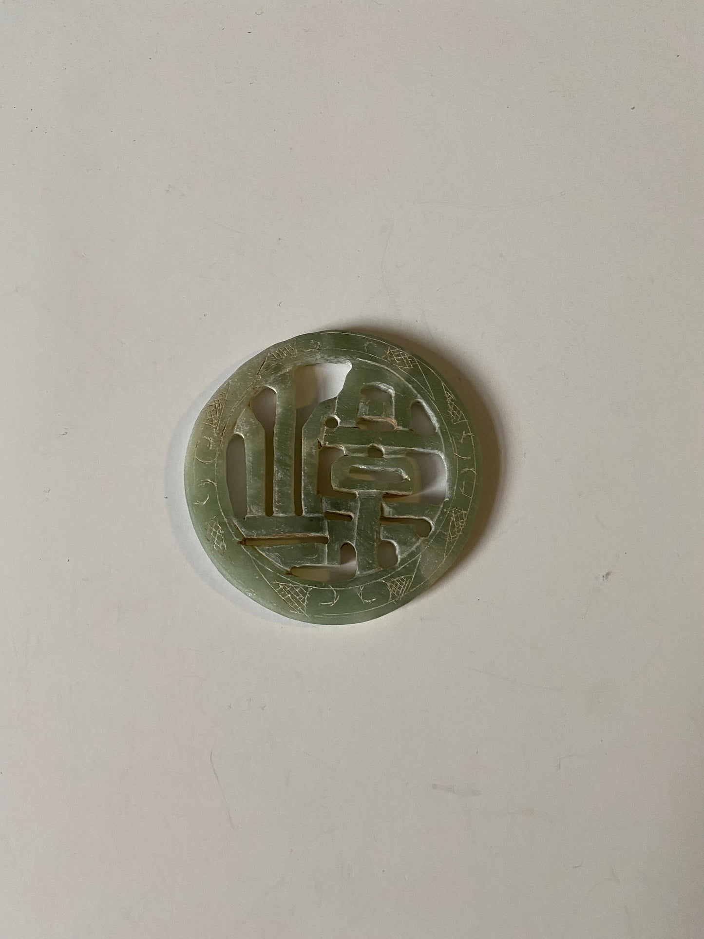 A Chinese 3 inch jade plaque