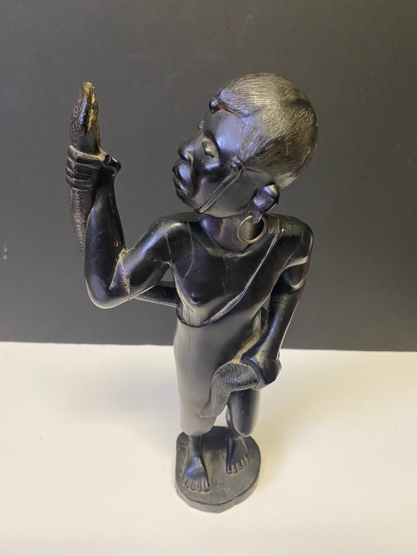 Absolutely spectacular 16 inch tall western African ebony statue of a snake charmer
