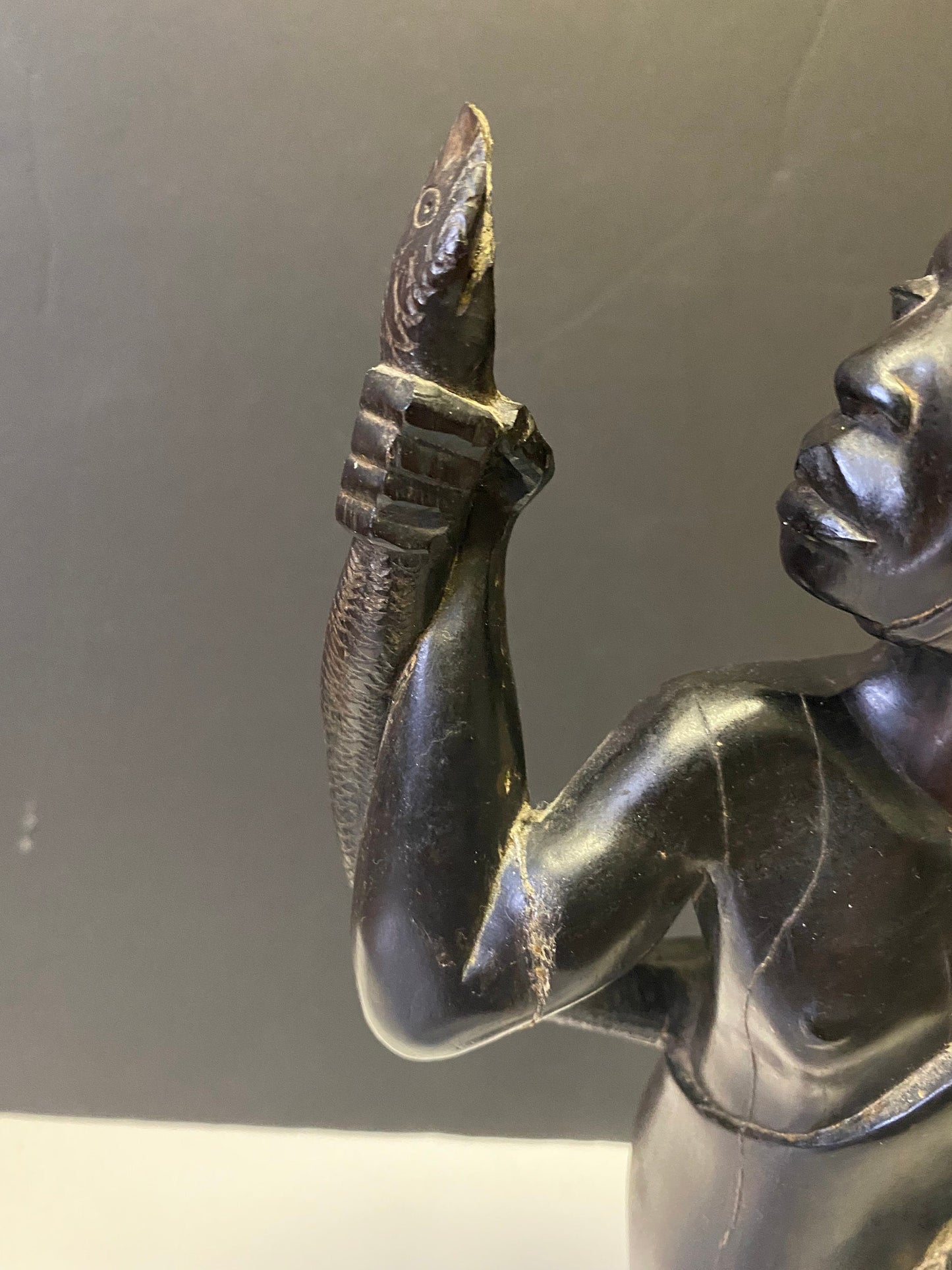 Absolutely spectacular 16 inch tall western African ebony statue of a snake charmer