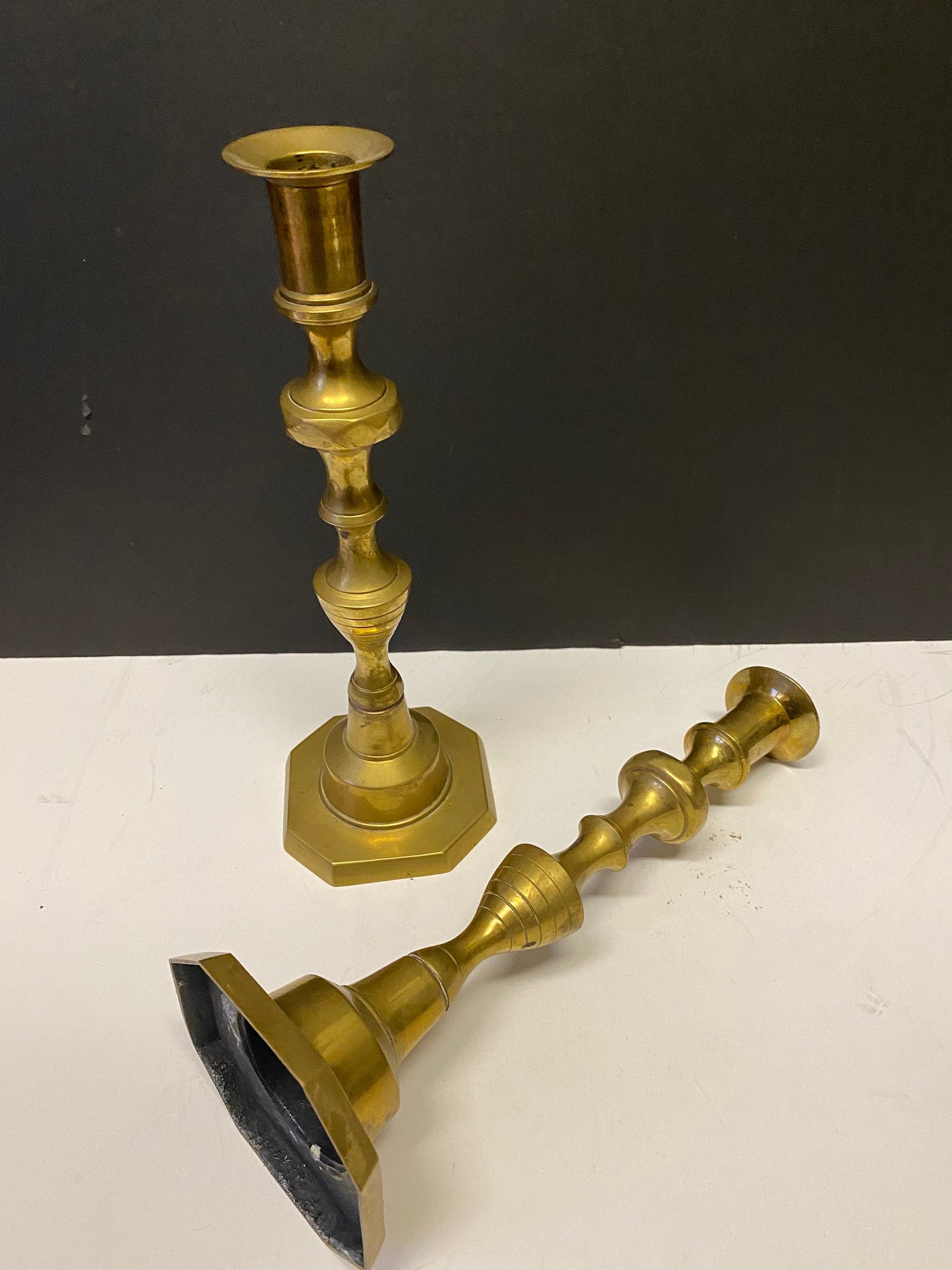 A  Pair heavy heavy brass Antique candlesticks 10 inches tall  Good quality  over 1kg