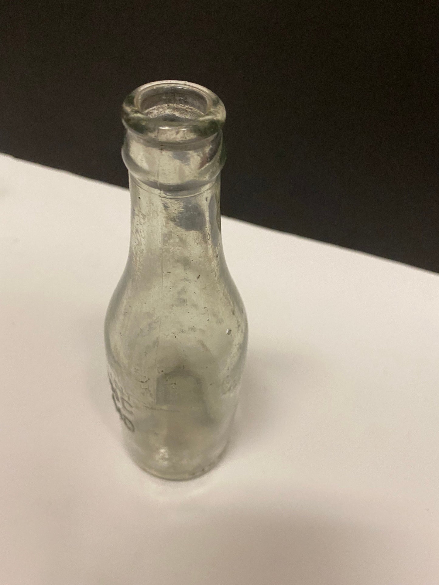 A  8 inch rumming nanaimo clear bottle  Canadian island bottle history  Dirty but good condition rare