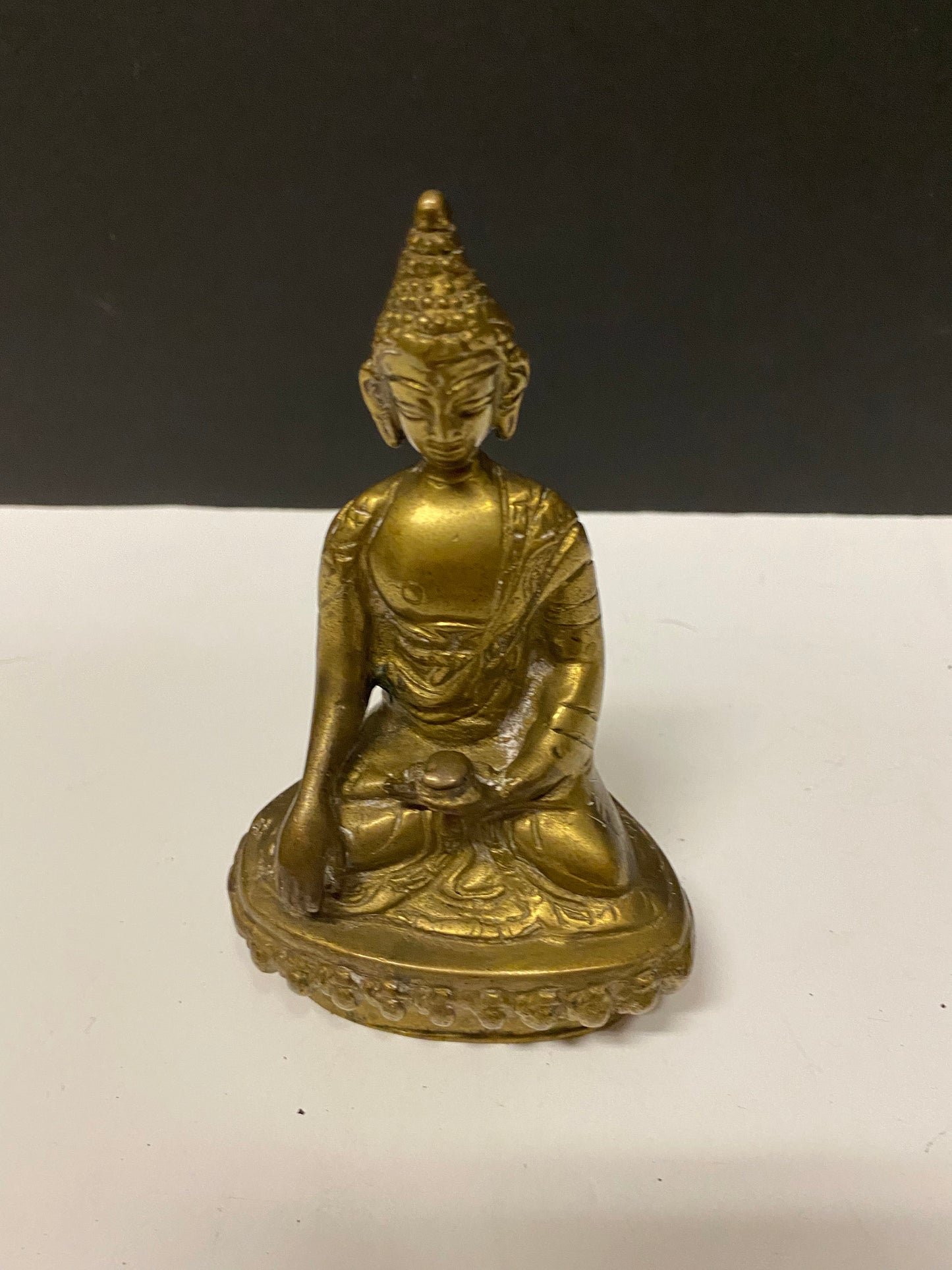 Antique asian brass Buddha 6 inches tall with great Patina  serene stature