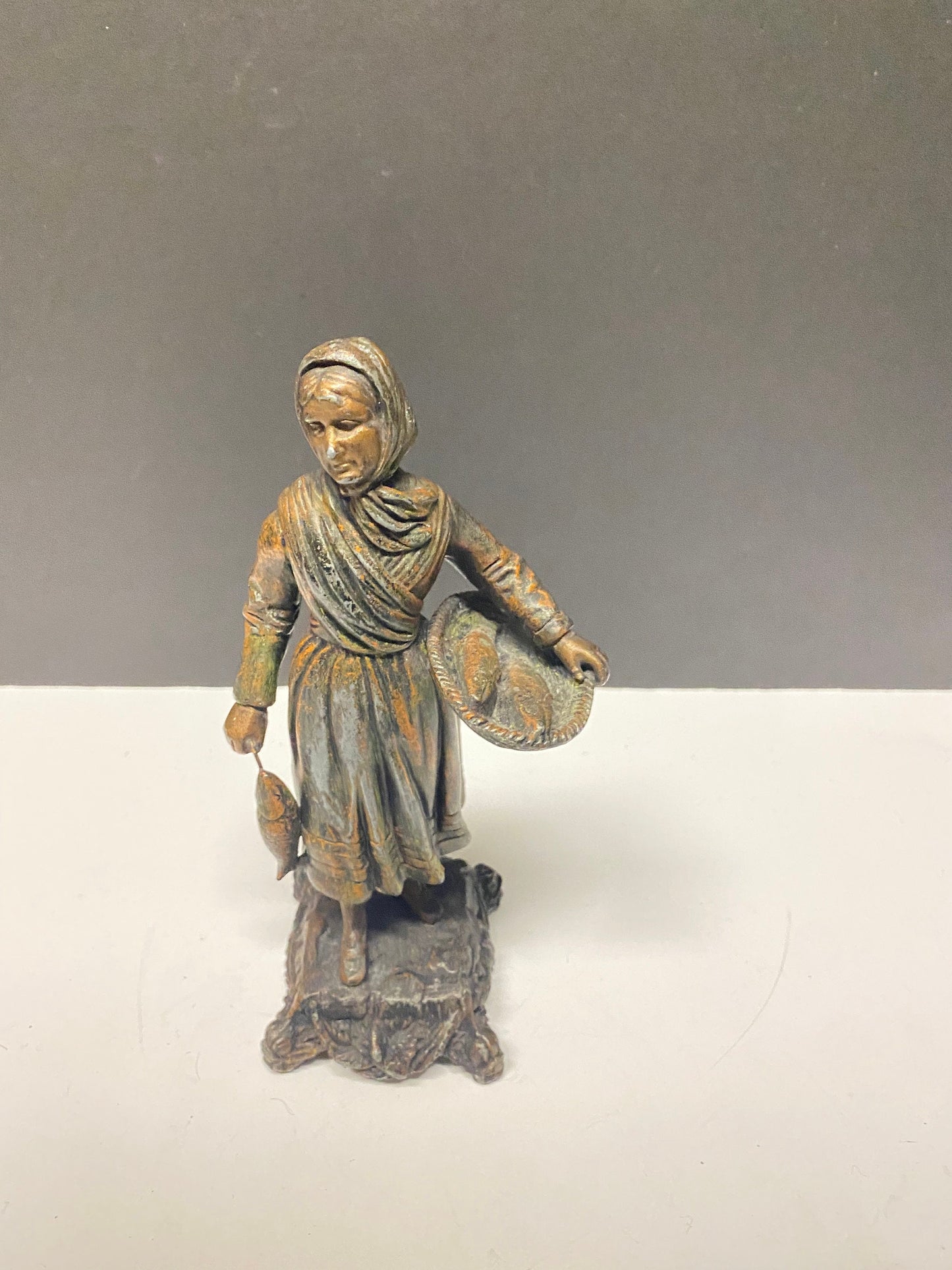 8 inch Absolutely fantastic antique European bronze statue of a fisher woman was wonderful Patina  great gift  wow