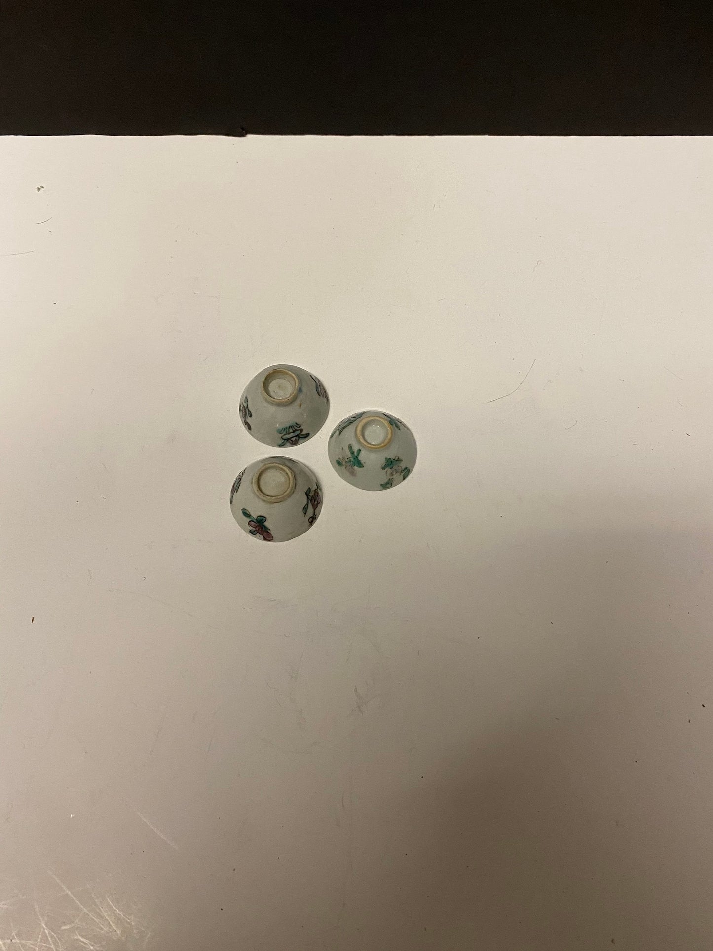 A Set of  3 antique Chinese hand decorated bowls  2 inches each  Spectacular decoration and condition very very old