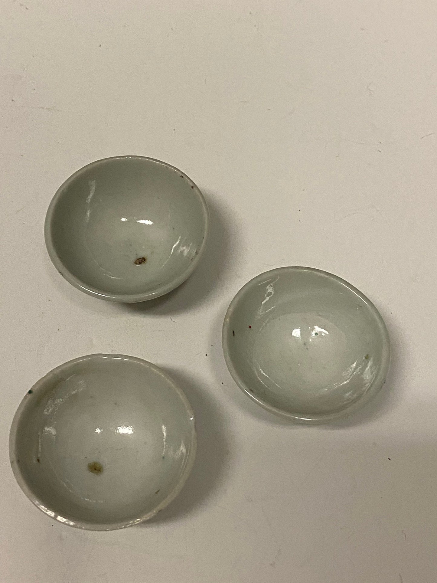 A Set of  3 antique Chinese hand decorated bowls  2 inches each  Spectacular decoration and condition very very old