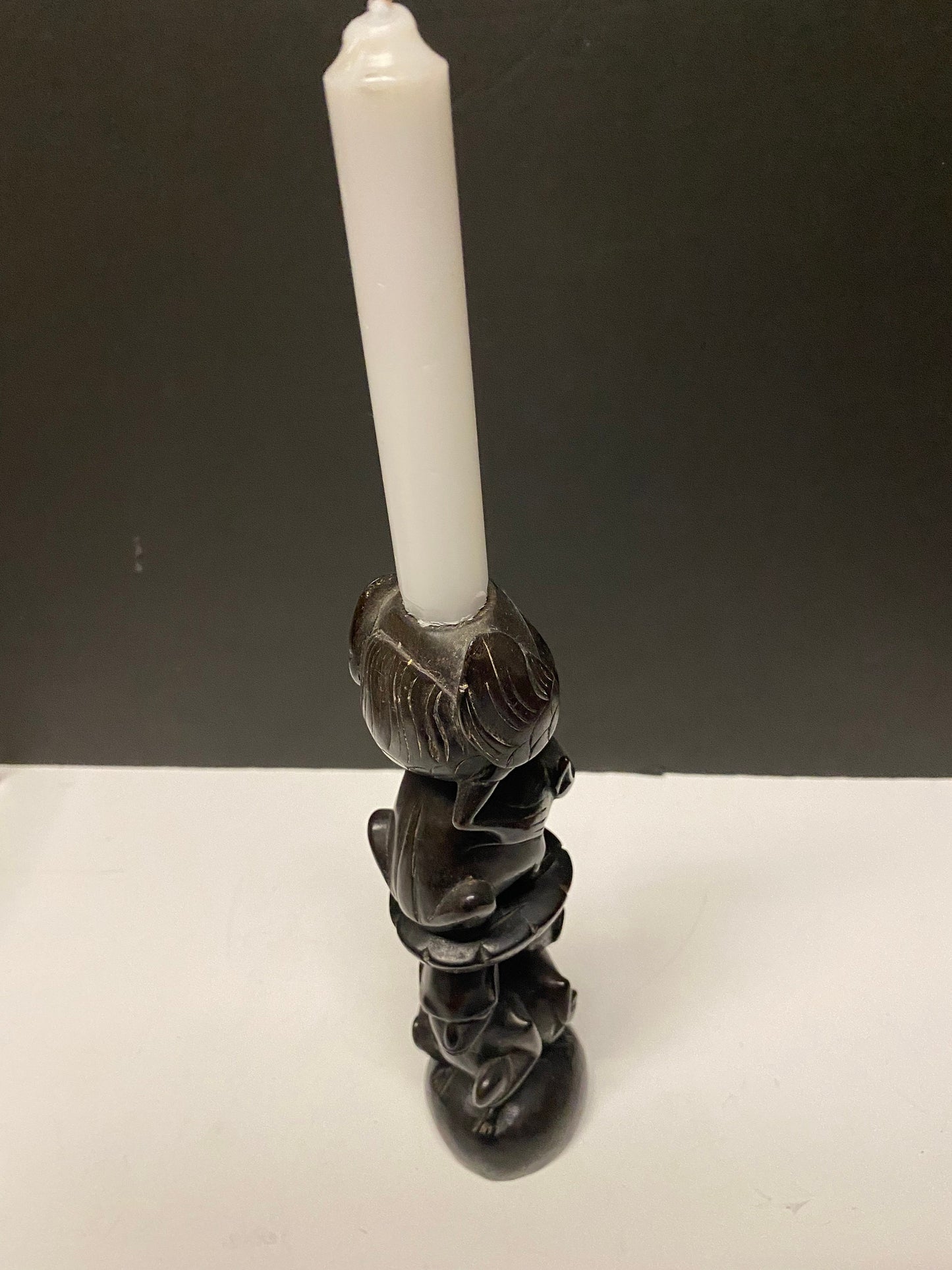 Very rare 10 inch Makonde African carved ebony candle holder  great imagery  older  museum quality  great gift