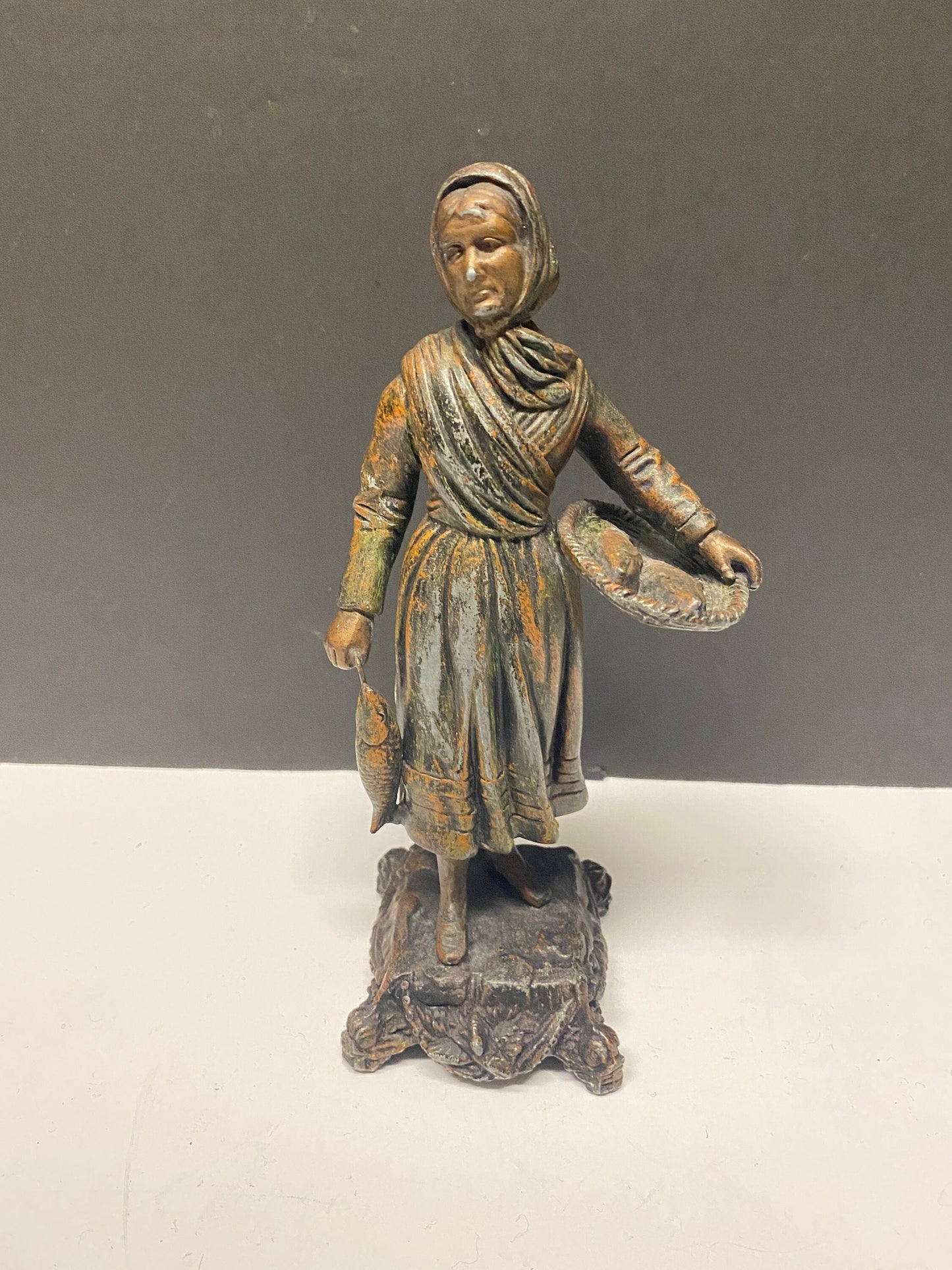 8 inch Absolutely fantastic antique European bronze statue of a fisher woman was wonderful Patina  great gift  wow