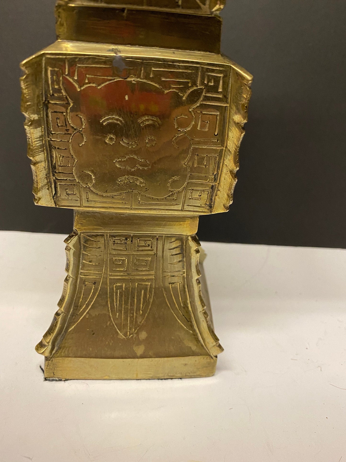 9 inch heavy Chinese brass vase with Chinese temple guardian faces  730 grams  lovely quality