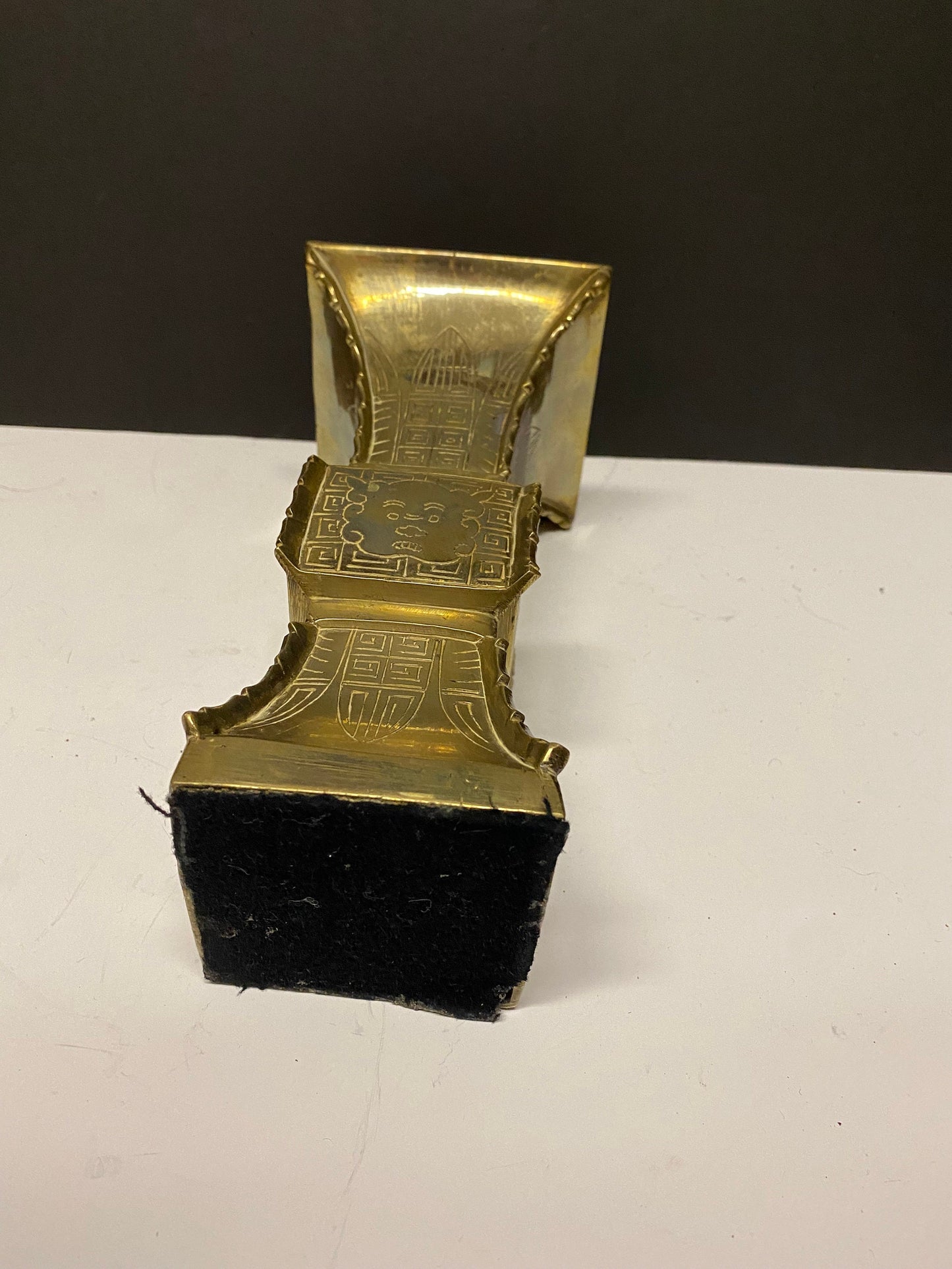 9 inch heavy Chinese brass vase with Chinese temple guardian faces  730 grams  lovely quality