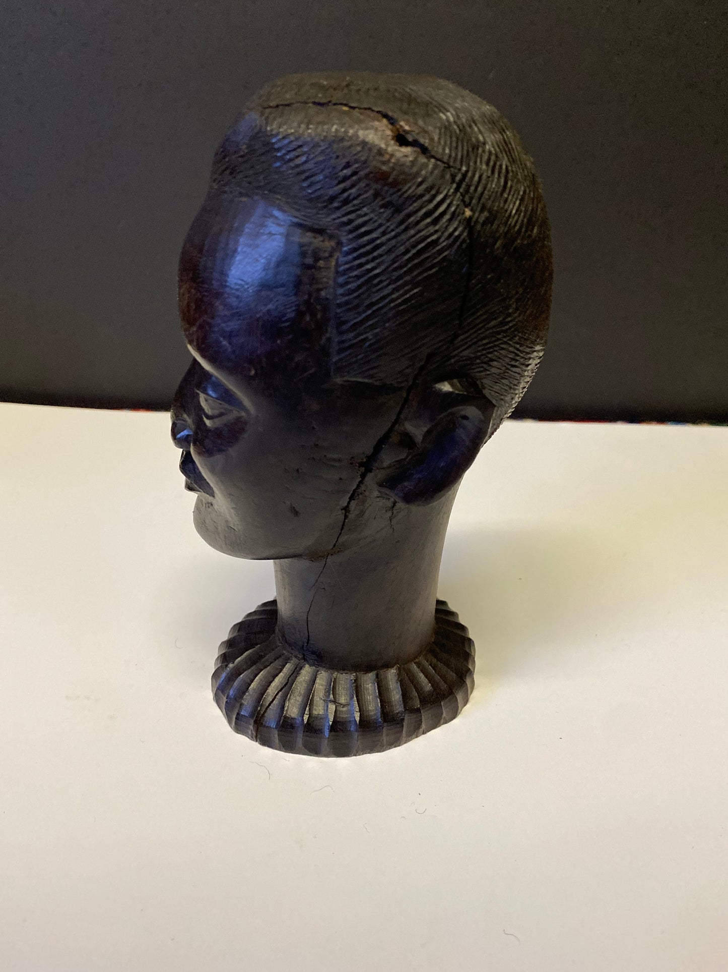 A  Fabulous western 8 inch African Carved Ebony bust of a male warrior  great detail  wow  seen some wars but tragically perfect