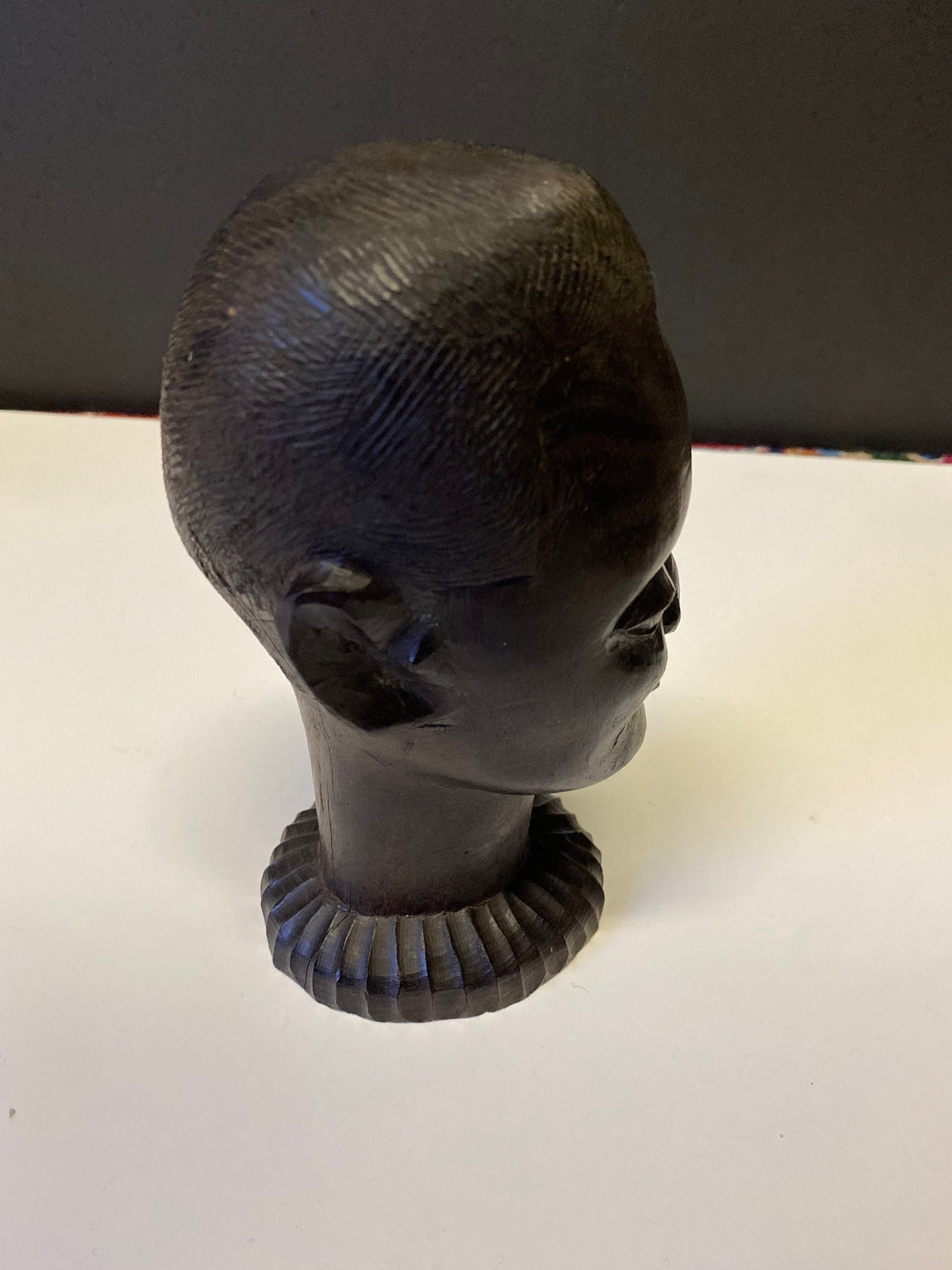 A  Fabulous western 8 inch African Carved Ebony bust of a male warrior  great detail  wow  seen some wars but tragically perfect