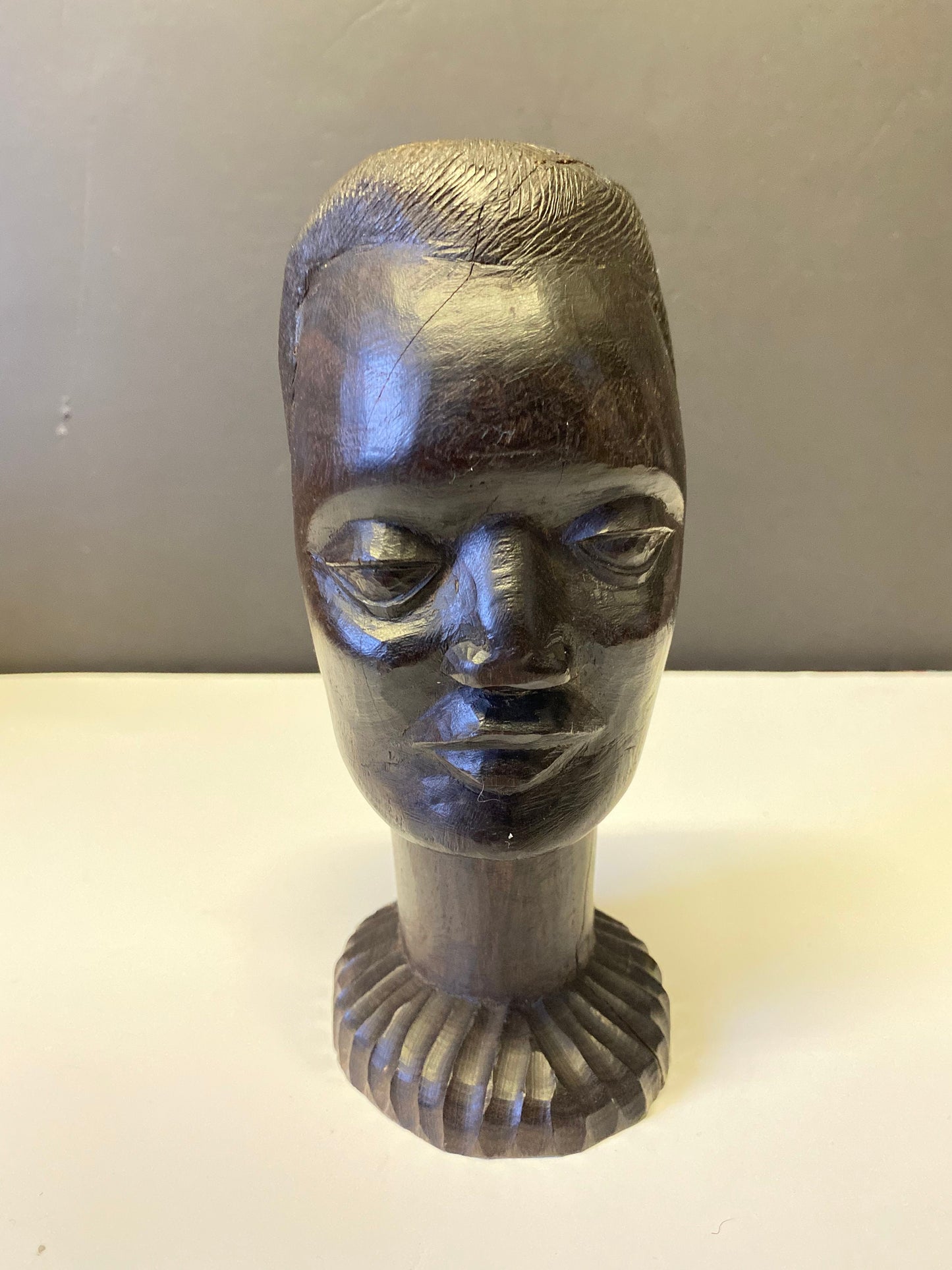 A  Fabulous western 8 inch African Carved Ebony bust of a male warrior  great detail  wow  seen some wars but tragically perfect