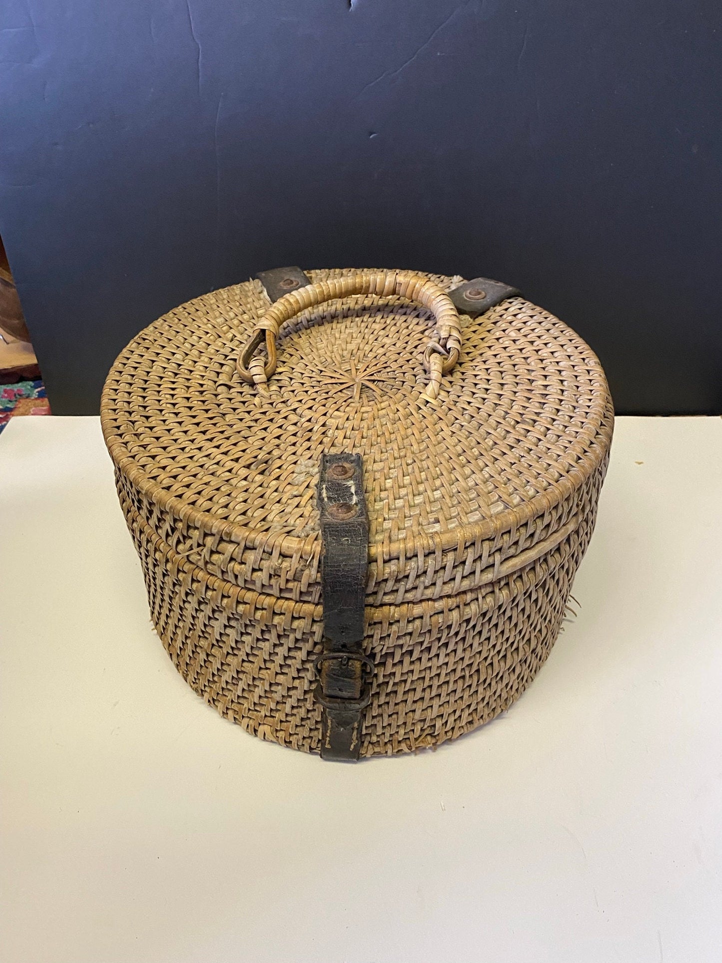 An  Absolutely fabulous Antique Asian weaved basket with leather accents great condition and a real statement piece  wow  -12 inches