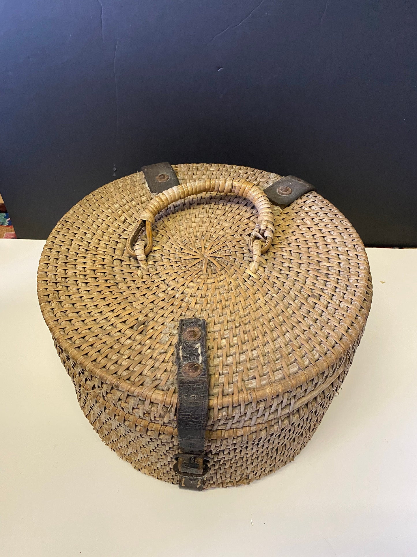 An  Absolutely fabulous Antique Asian weaved basket with leather accents great condition and a real statement piece  wow  -12 inches