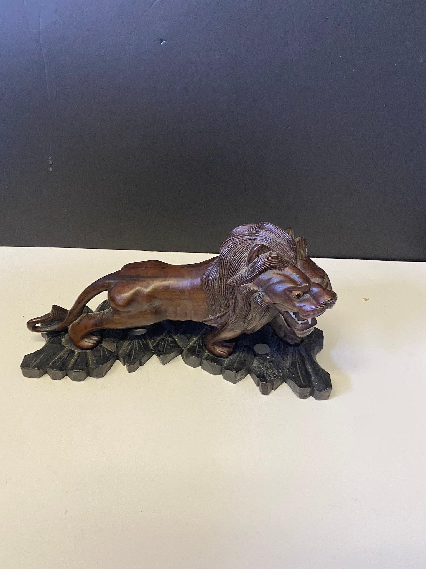 A  Fabulous 12 x 8 African ebony hardwood Carved lion on stand  regal and well carved  Would make a fabulous gift