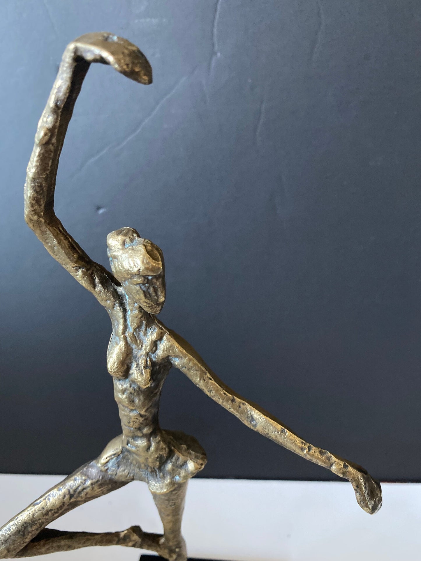 A  Stunning 14 inch tall Bronze statue of a dancer by Alberto Giocometti Wonderful Patina very cool look -  great anniversary gift!!
