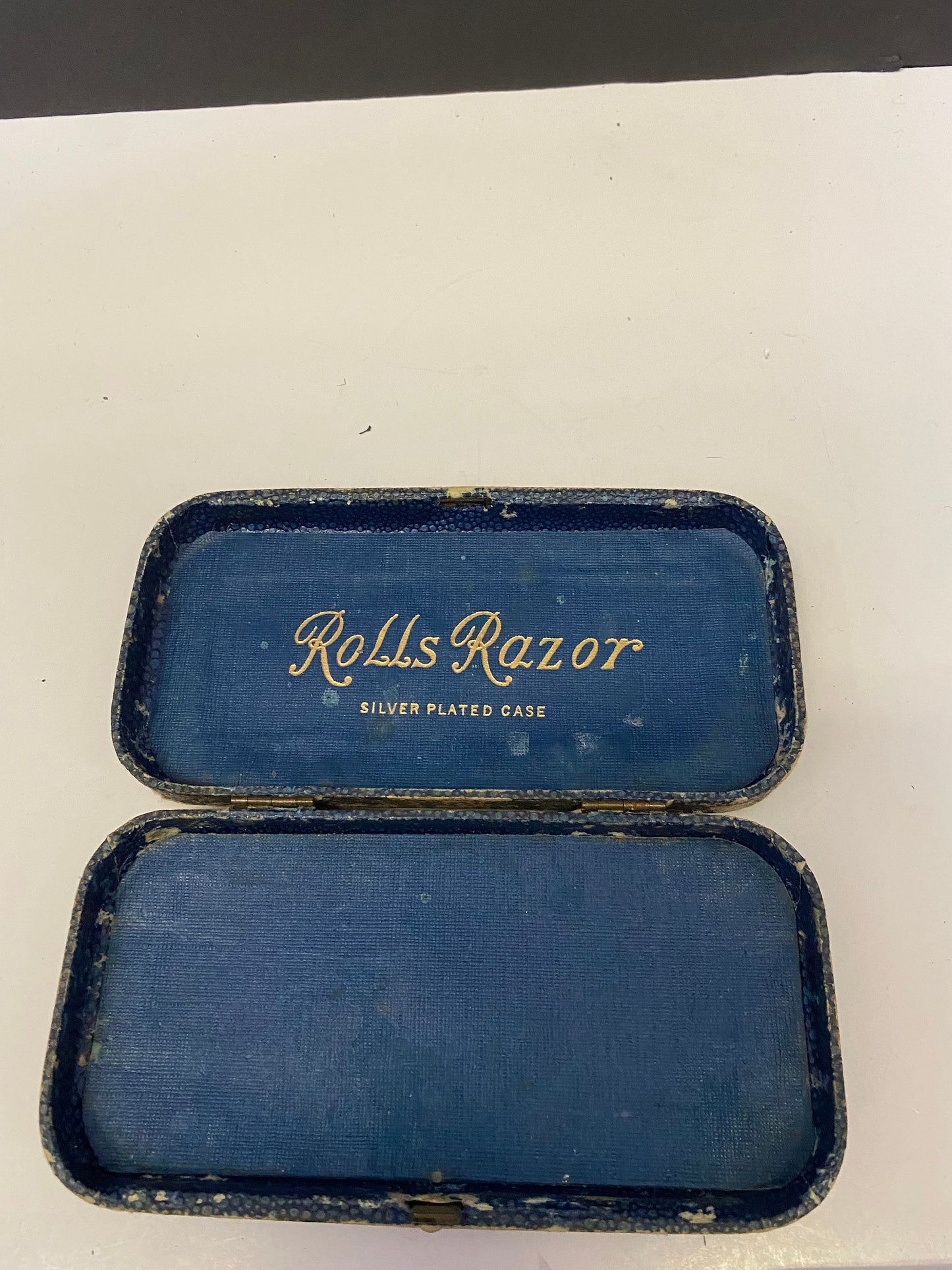 An  Antique rolls razor set in silver plated case  in original case  antique condition  great decoration  gift for  your barber