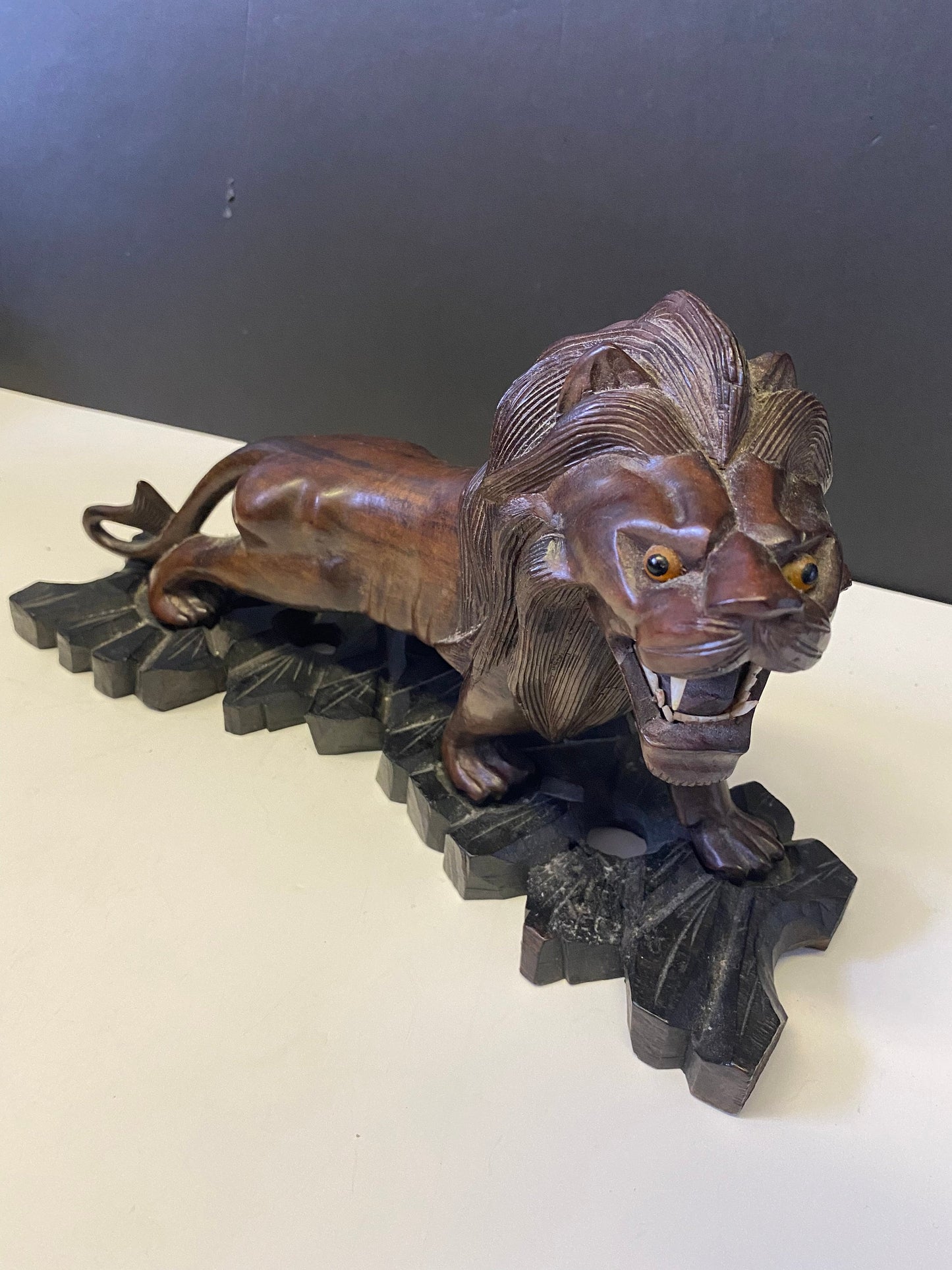 A  Fabulous 12 x 8 African ebony hardwood Carved lion on stand  regal and well carved  Would make a fabulous gift