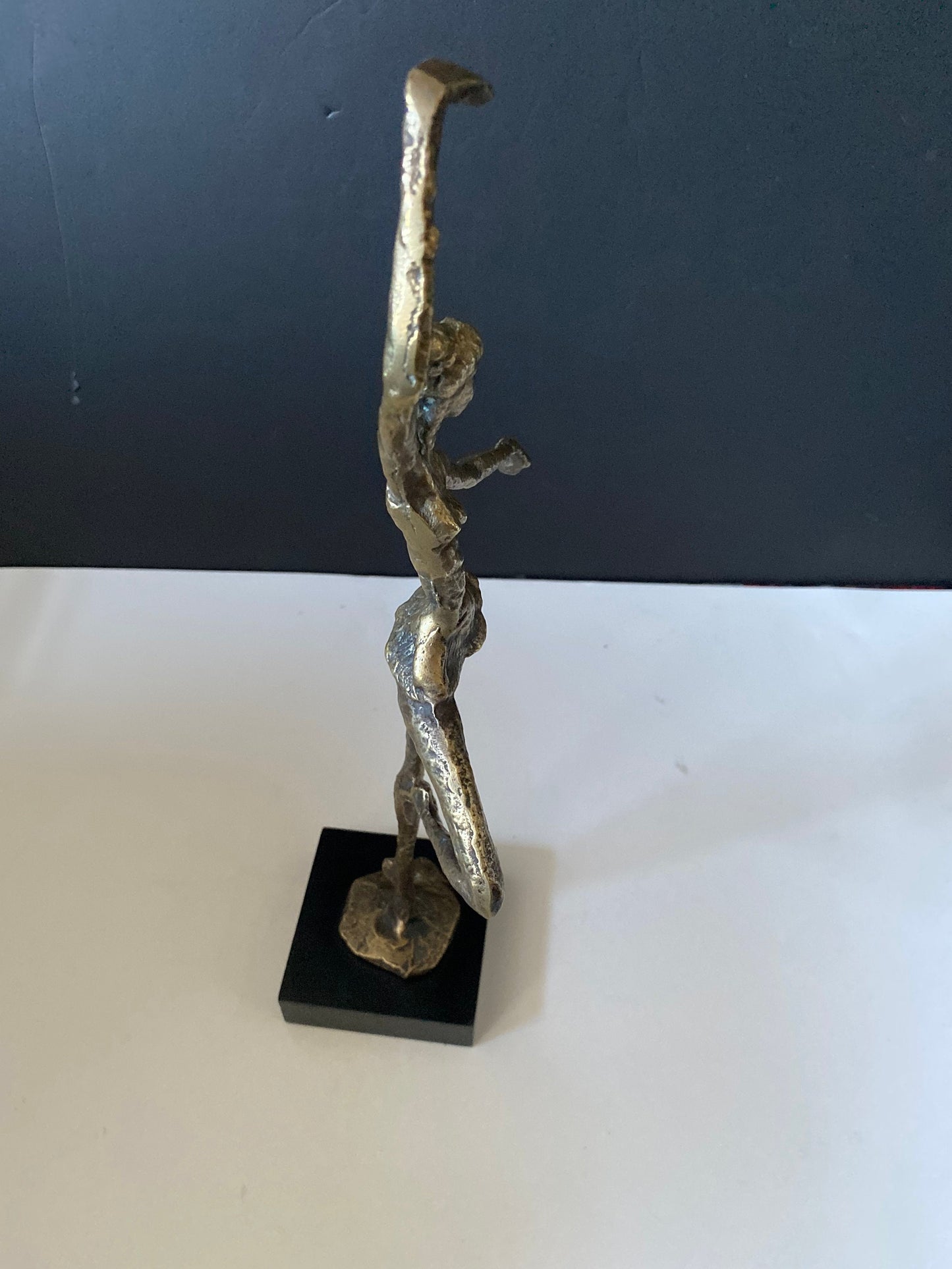 A  Stunning 14 inch tall Bronze statue of a dancer by Alberto Giocometti Wonderful Patina very cool look -  great anniversary gift!!