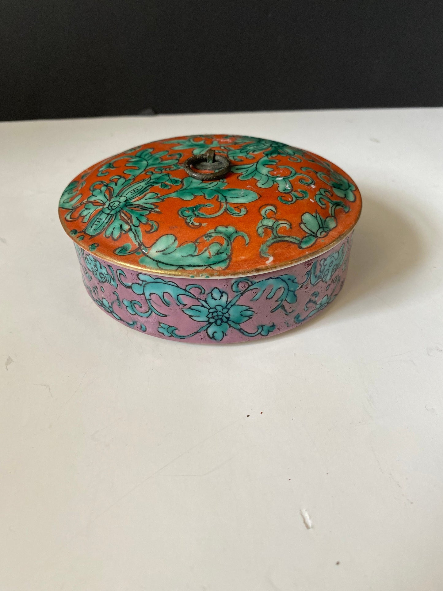 An Absolutely fabulous Antique  Chinese famille rose porcelain box with bronze  top  Rare double facetted colour scheme  5 x 2 inches