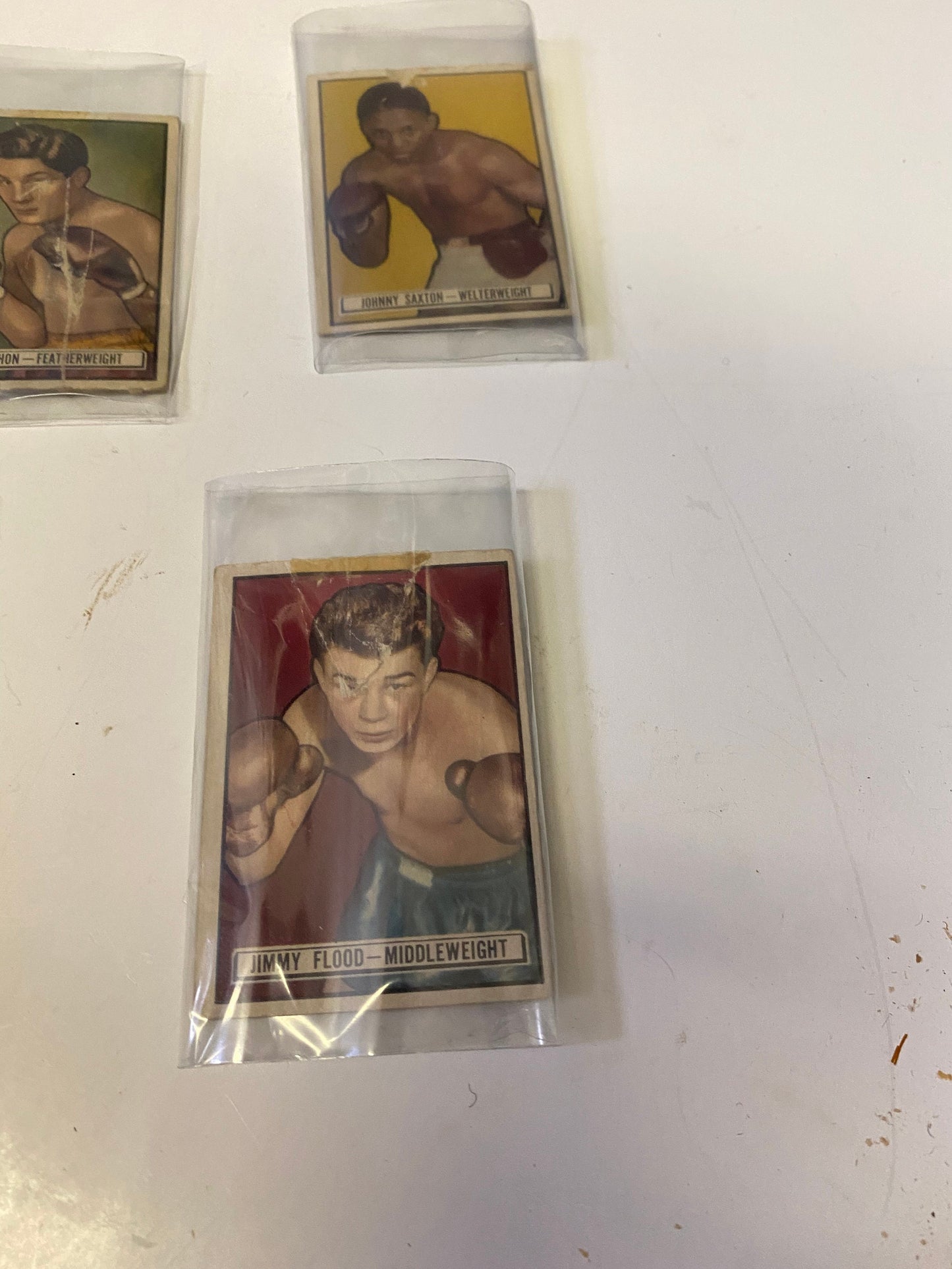 An amazing set up four 1940s ringside boxing cards  All antique condition but very cool boxing memorabilia  sold as set  3 x 2 inches