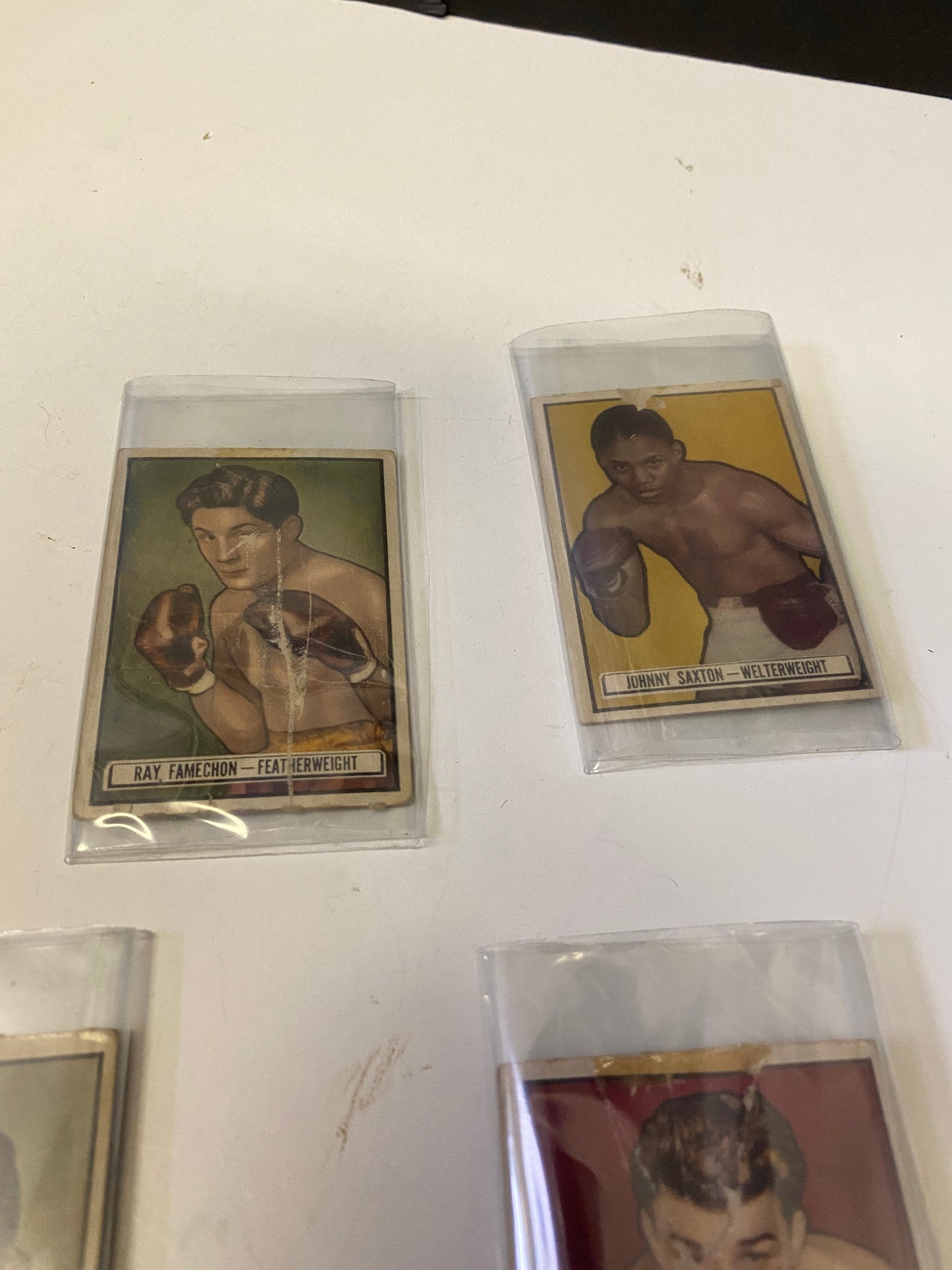 An amazing set up four 1940s ringside boxing cards  All antique condition but very cool boxing memorabilia  sold as set  3 x 2 inches