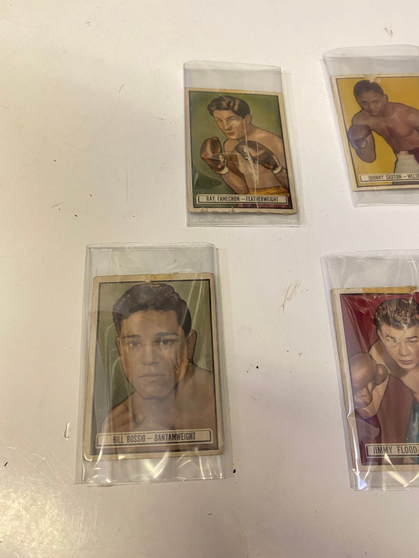 An amazing set up four 1940s ringside boxing cards  All antique condition but very cool boxing memorabilia  sold as set  3 x 2 inches