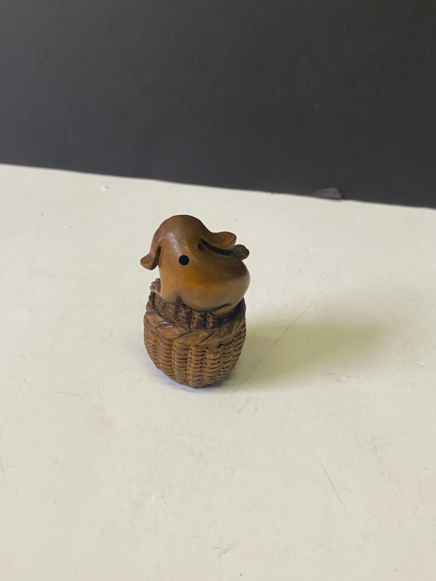 Absolutely fabulous 2 inch antique authentic Boxwood netsuke of a puppy in basket  Unbelievable detail  wow