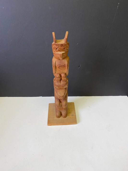 13 x 7 1970s indigenous Canadian female signed Indigenous totem pole  Thunderbird to human and transformation  well carved