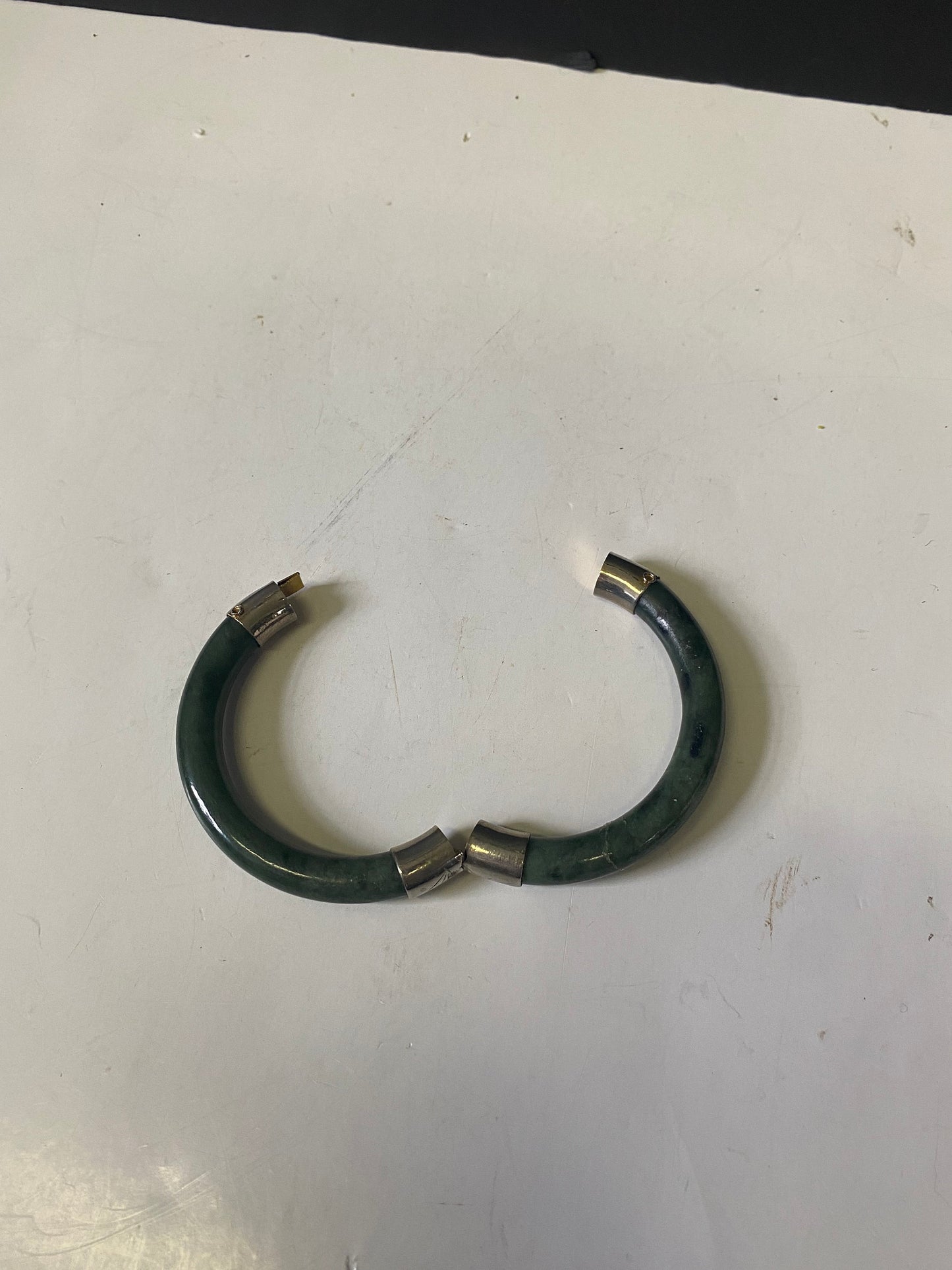 Lovely jade bangle with small crack  value priced  2.3 inches inside