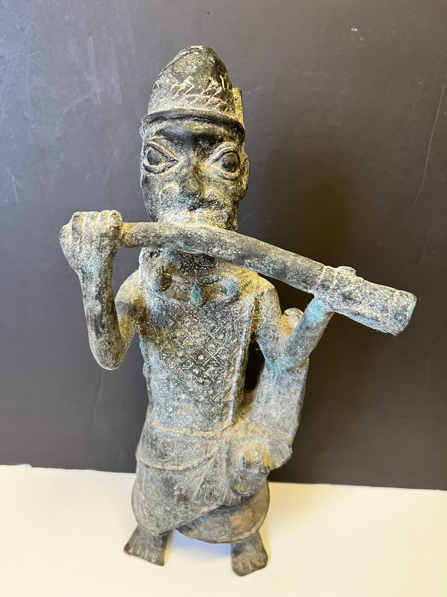 Absolutely magical 13 inch tall African Dogan bronze statue playing an instrument  Early 19 century or earlier  Wonderful Patina