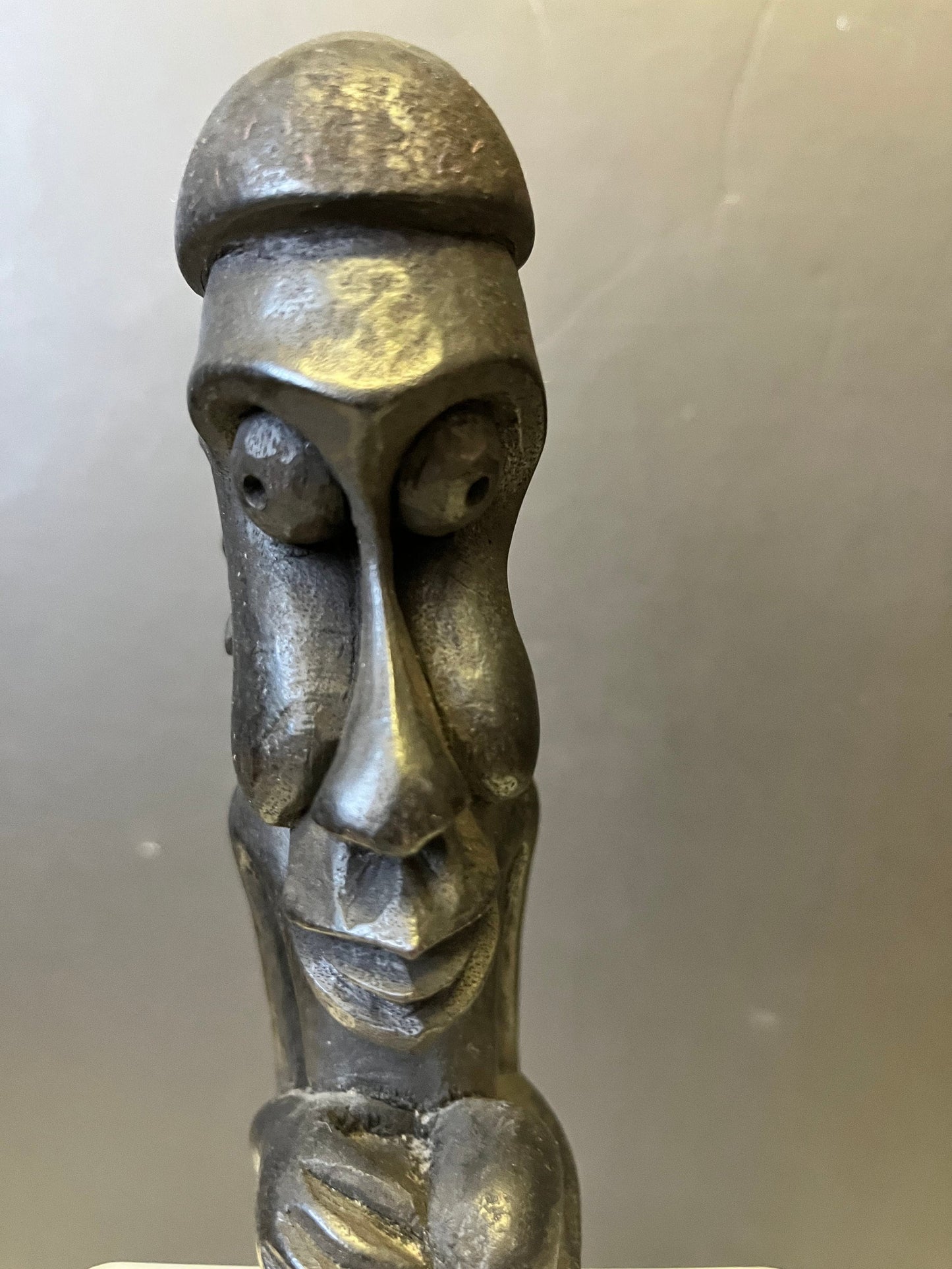 Wonderful 8.5 inch tall western African older  statue well detailed with crazy eyes  unique piece