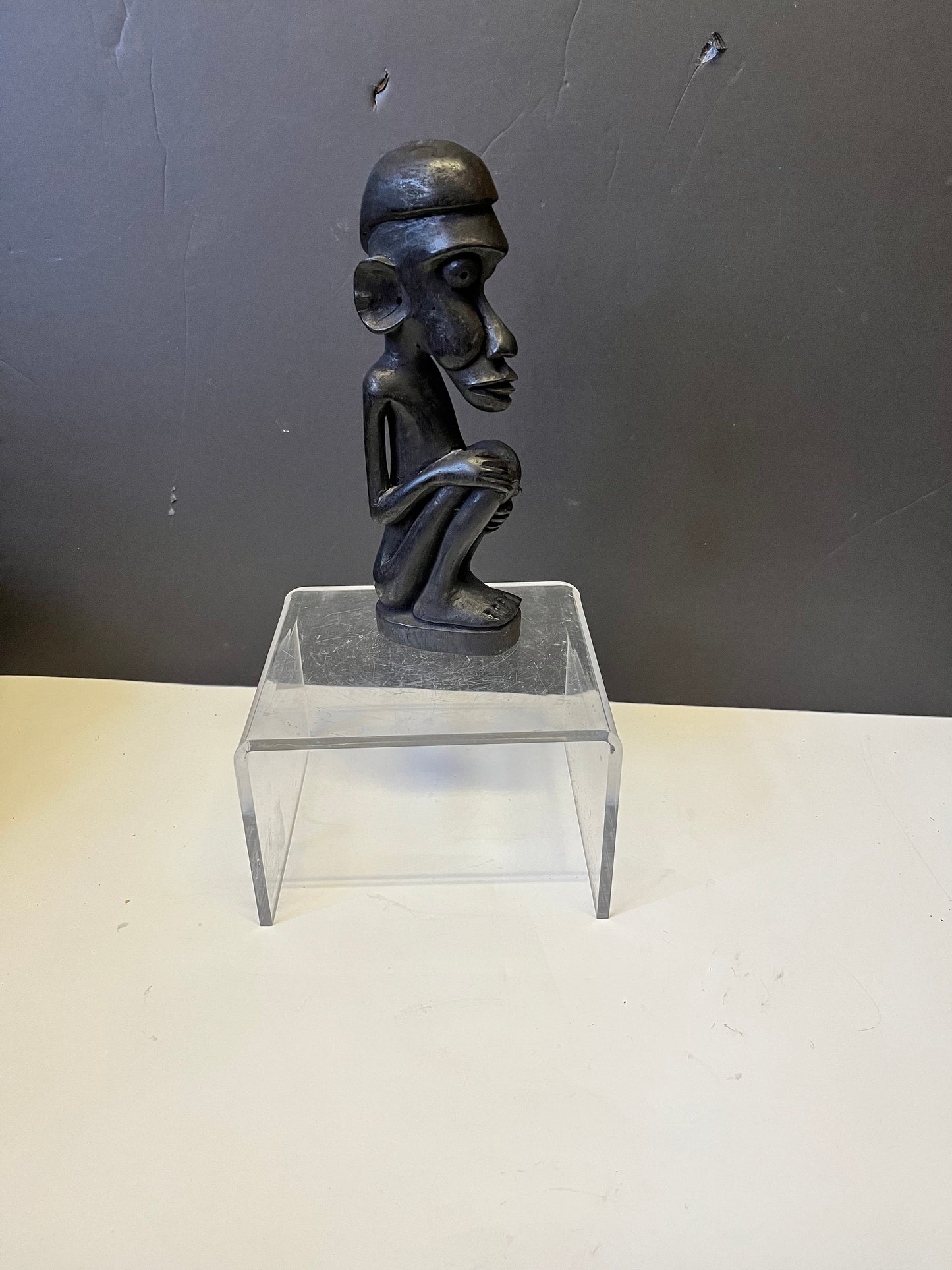 Wonderful 8.5 inch tall western African older  statue well detailed with crazy eyes  unique piece