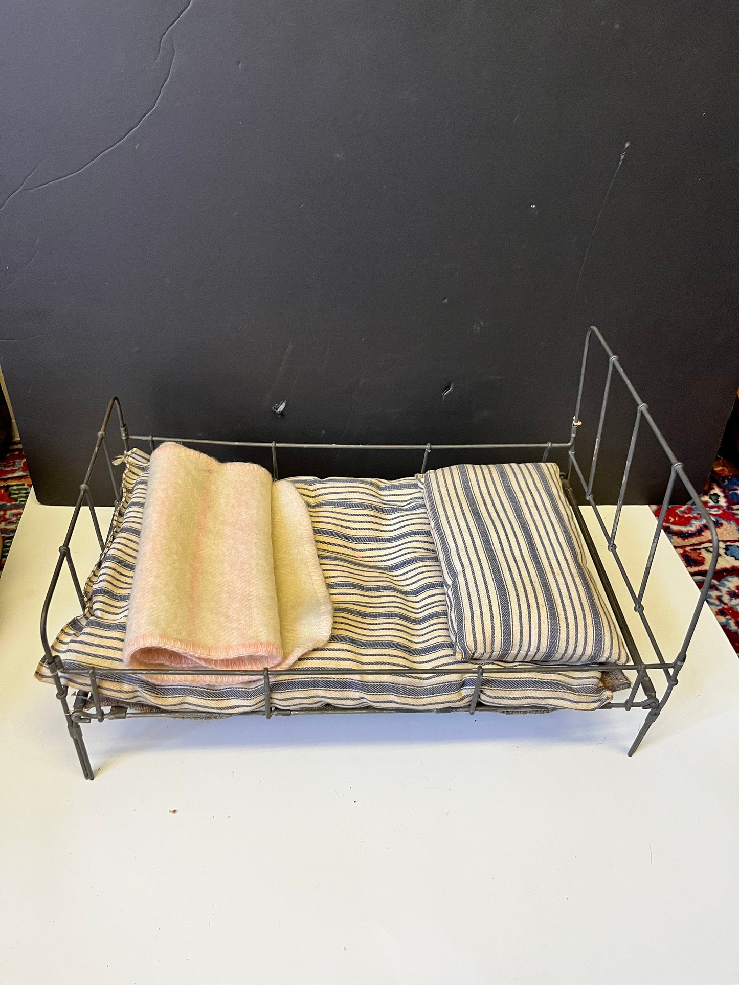 Very rare approximately 1840s English antique child doll bed  18 x 11 x 10 high and with all original blankets etc - wow