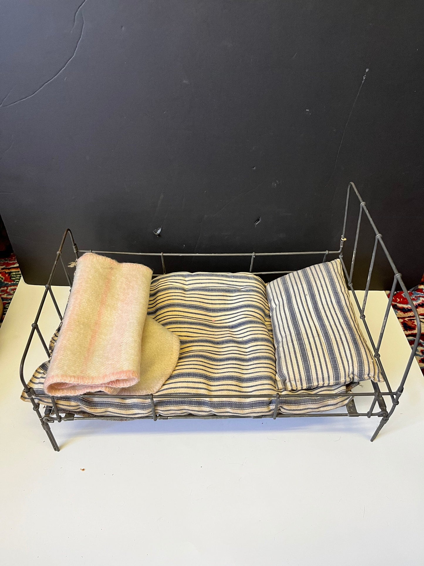 Very rare approximately 1840s English antique child doll bed  18 x 11 x 10 high and with all original blankets etc - wow