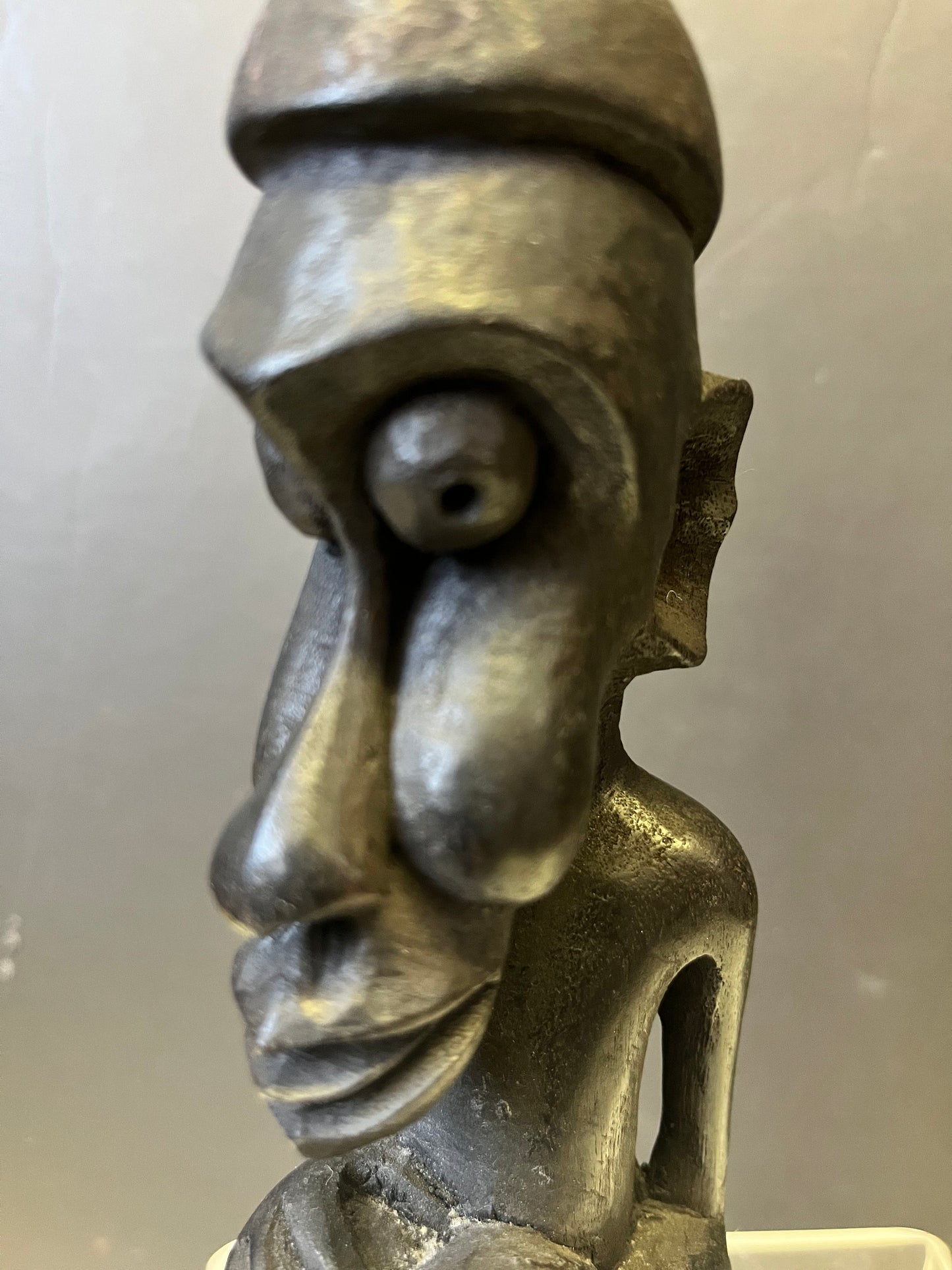 Wonderful 8.5 inch tall western African older  statue well detailed with crazy eyes  unique piece