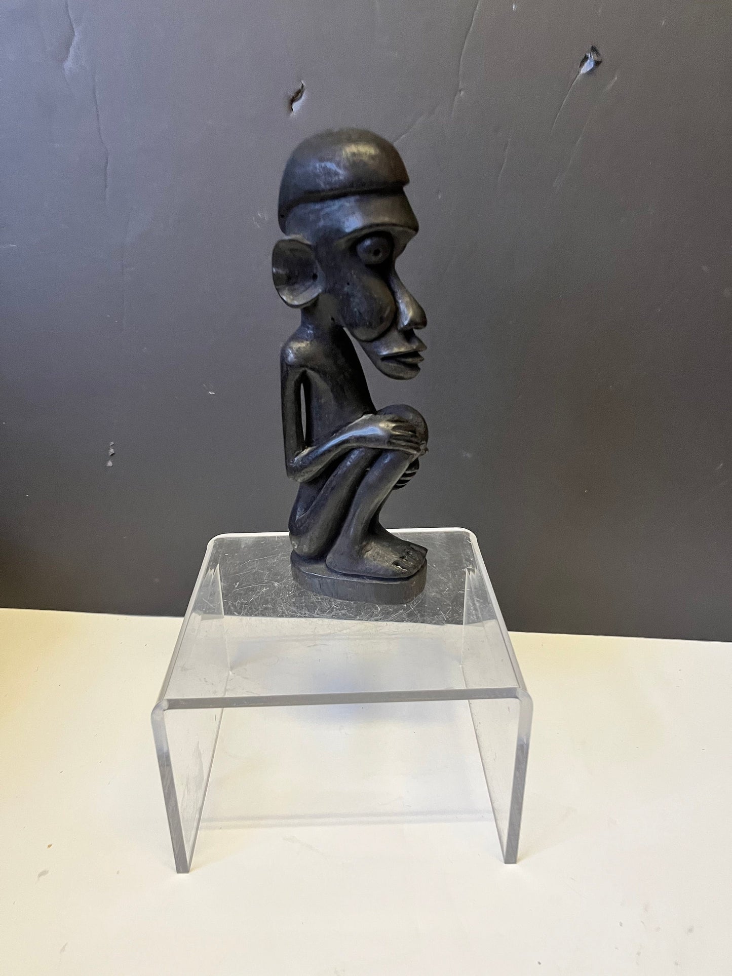 Wonderful 8.5 inch tall western African older  statue well detailed with crazy eyes  unique piece