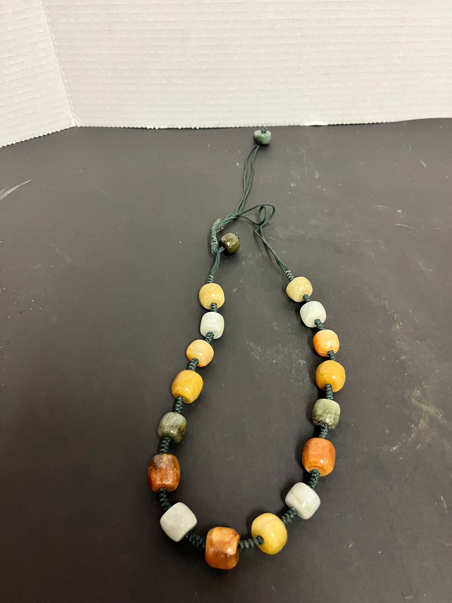 Absolutely fabulous approximately 23 inch long adjustable stone necklace  Variety of different stones all polished and wonderful quality