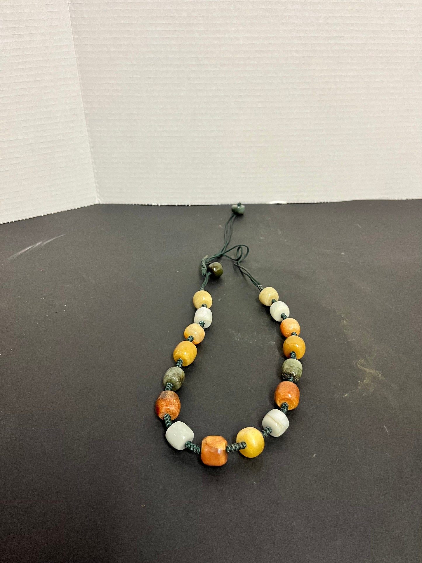Absolutely fabulous approximately 23 inch long adjustable stone necklace  Variety of different stones all polished and wonderful quality