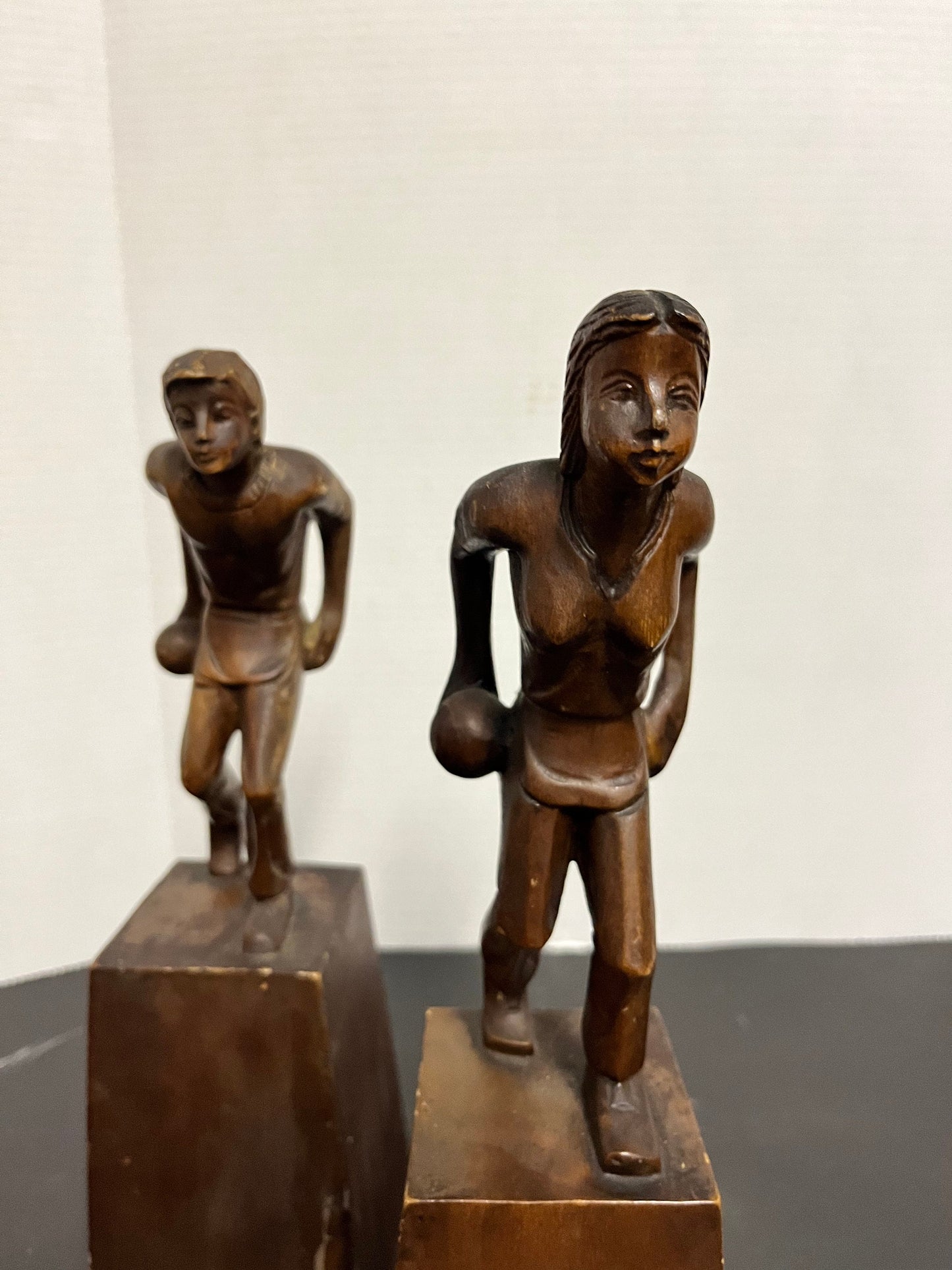 Absolutely magnificent museum quality one of a kind 13 x 4 high pair of 1920s or earlier oceanic wooden bowling statues