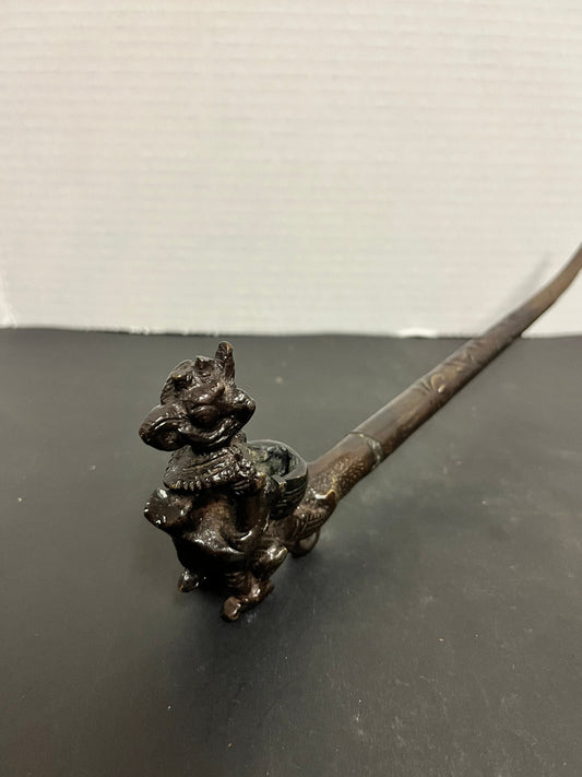 Absolutely fabulous 11 inch long Tibetan bronze pipe depicting a mythical creature with great detail and patina  gift alert