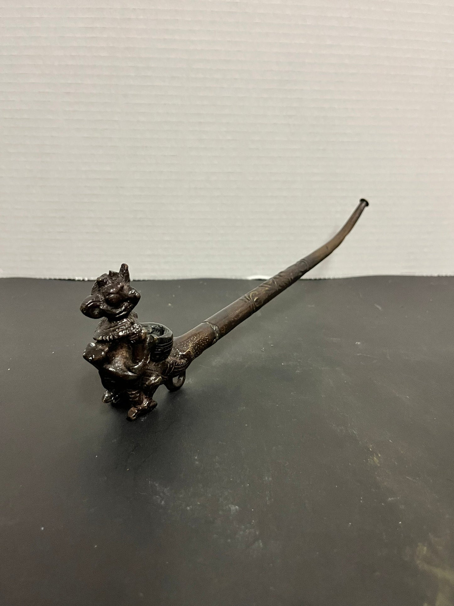 Absolutely fabulous 11 inch long Tibetan bronze pipe depicting a mythical creature with great detail and patina  gift alert