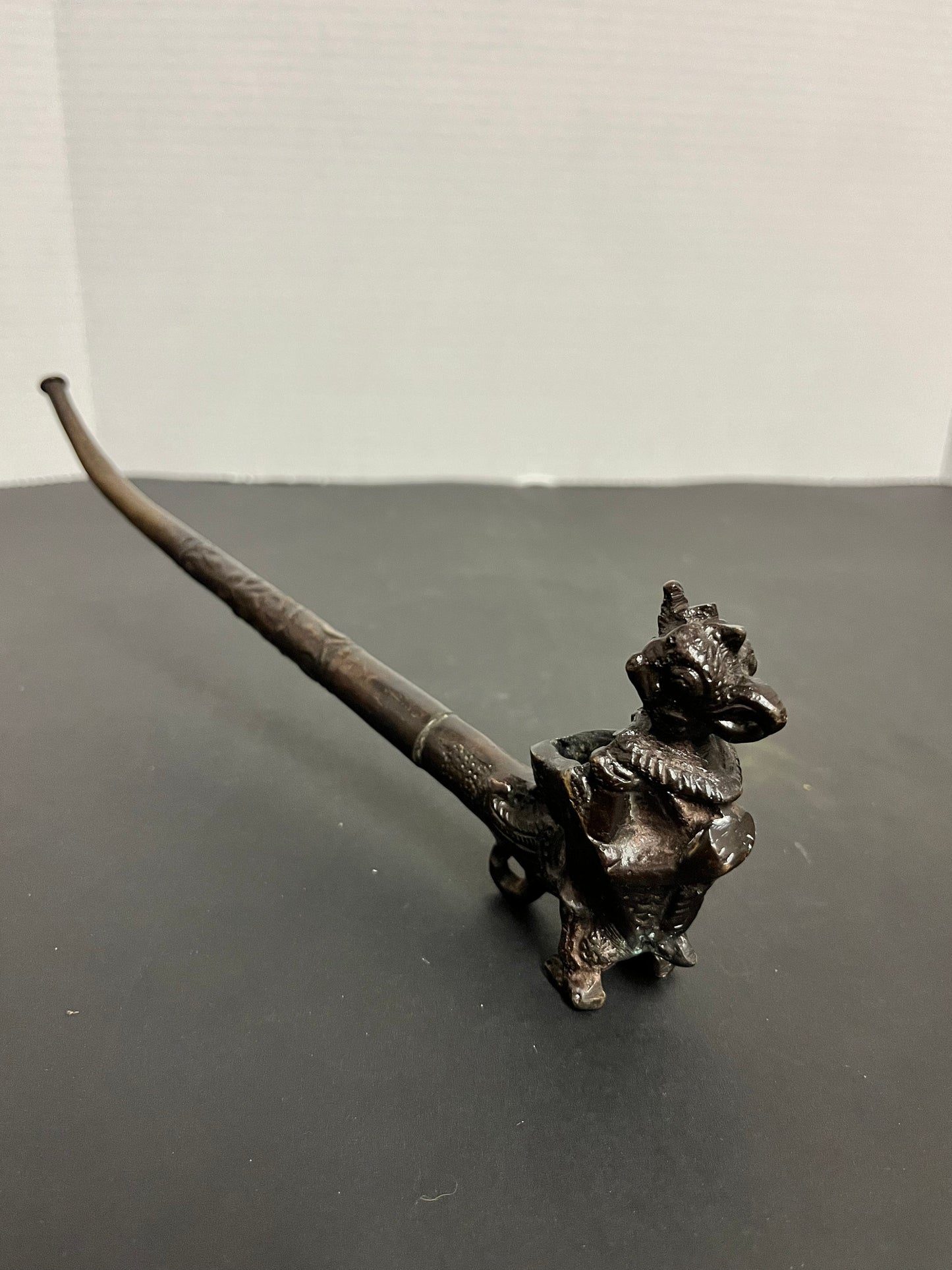 Absolutely fabulous 11 inch long Tibetan bronze pipe depicting a mythical creature with great detail and patina  gift alert