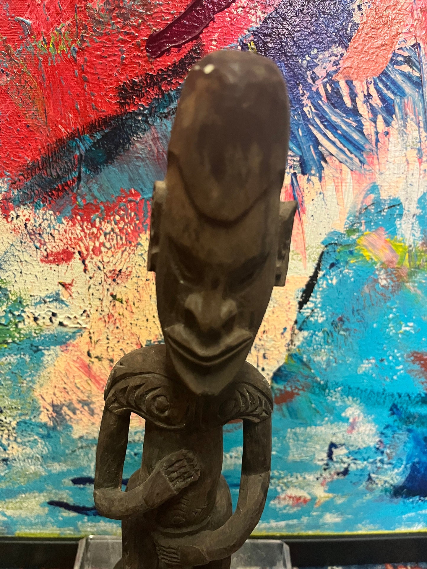 Absolutely fantastic 13 inch high antique African wooden statue of a man in a provocative position  Museum quality at a great price